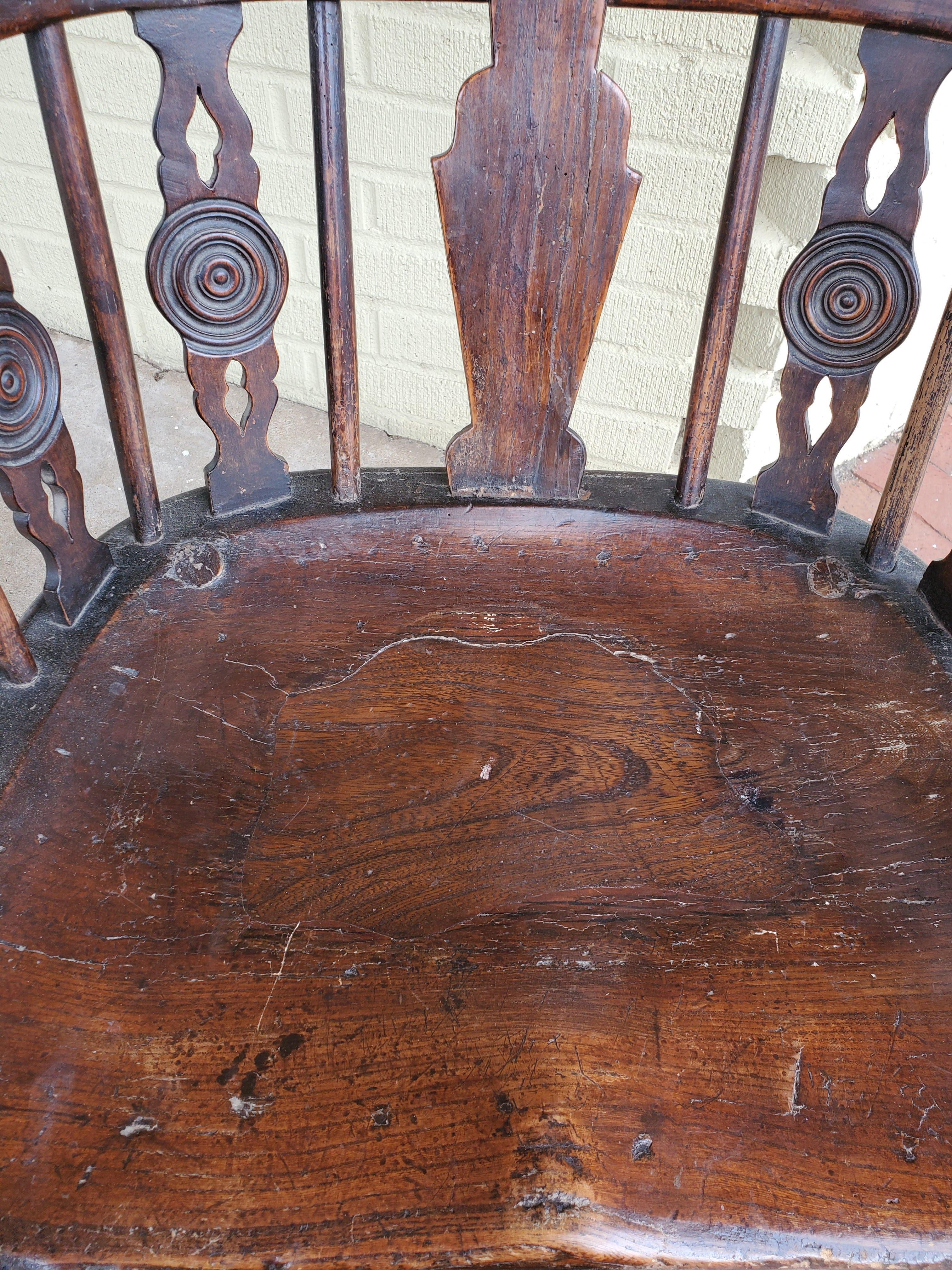 Early 18th Century English Comb-Back Windsor Armchair Dark Ash, Elm, Walnut 6