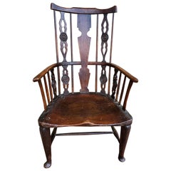 Early 18th Century English Comb-Back Windsor Armchair Dark Ash, Elm, Walnut