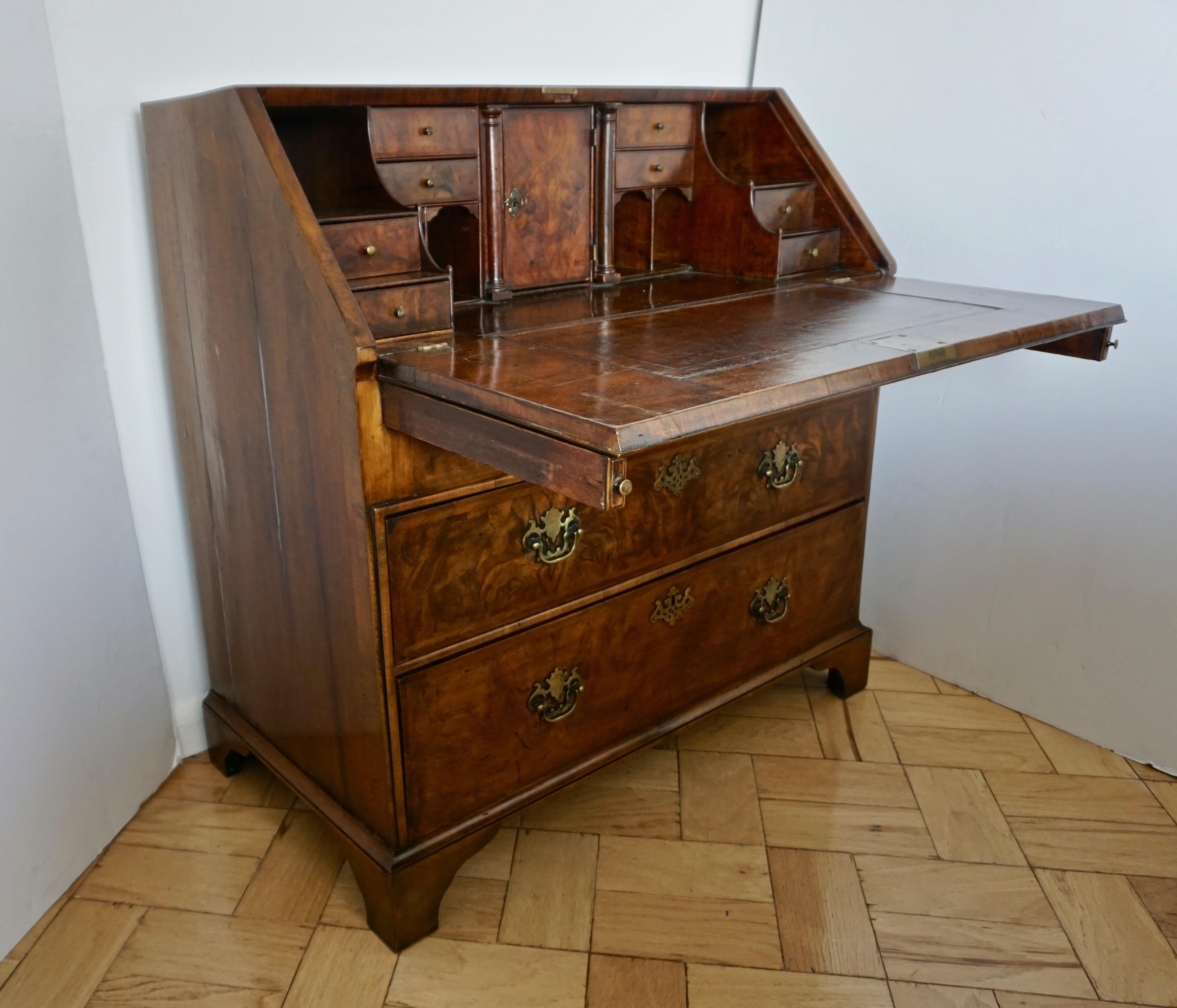 Exceptional condition for this English secretaire/chest/desk of George I period. The finish in figured burl walnut adds aesthetic beauty to the history of this piece acquired by Cosulich Interiors & Antiques from a collector in Yorkshire. Georgian