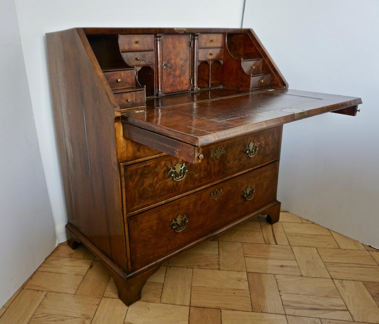 Exceptional condition for this English secretaire/chest/desk of George I period. The finish in figured burl walnut adds aesthetic beauty to the history of this piece acquired by Cosulich Interiors & Antiques from a collector in Yorkshire. Georgian