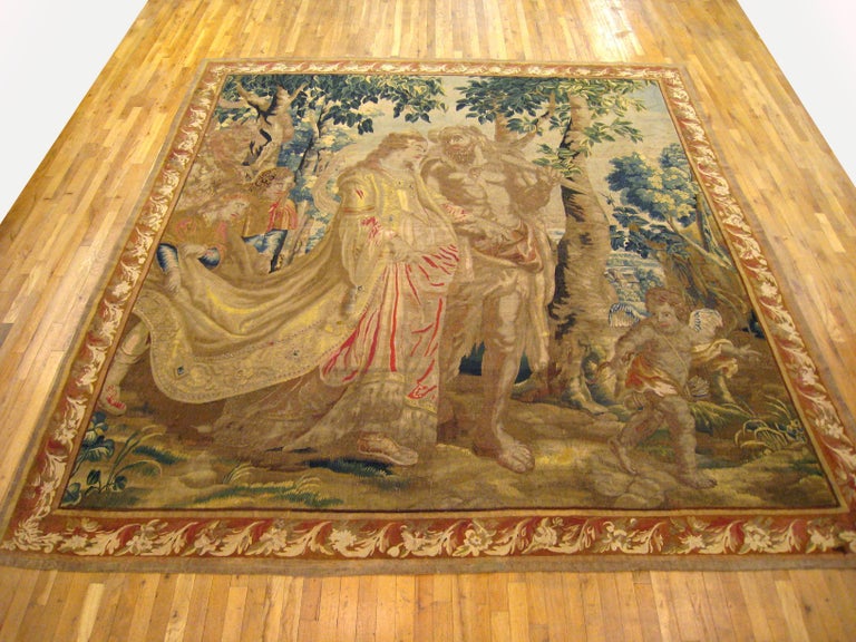 A Flemish mythological tapestry from the late 17th or early 18th century, envisioning Odysseus and Penelope, in a scene from the culmination of The Odyssey. Measures: 11’0” H x 10’0” W.

For twenty years, Odysseus, the king of Ithaca, is away from