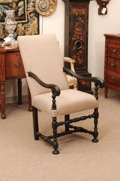 Early 18th Century French Louis XIII Walnut Fauteuil with Scroll Arms