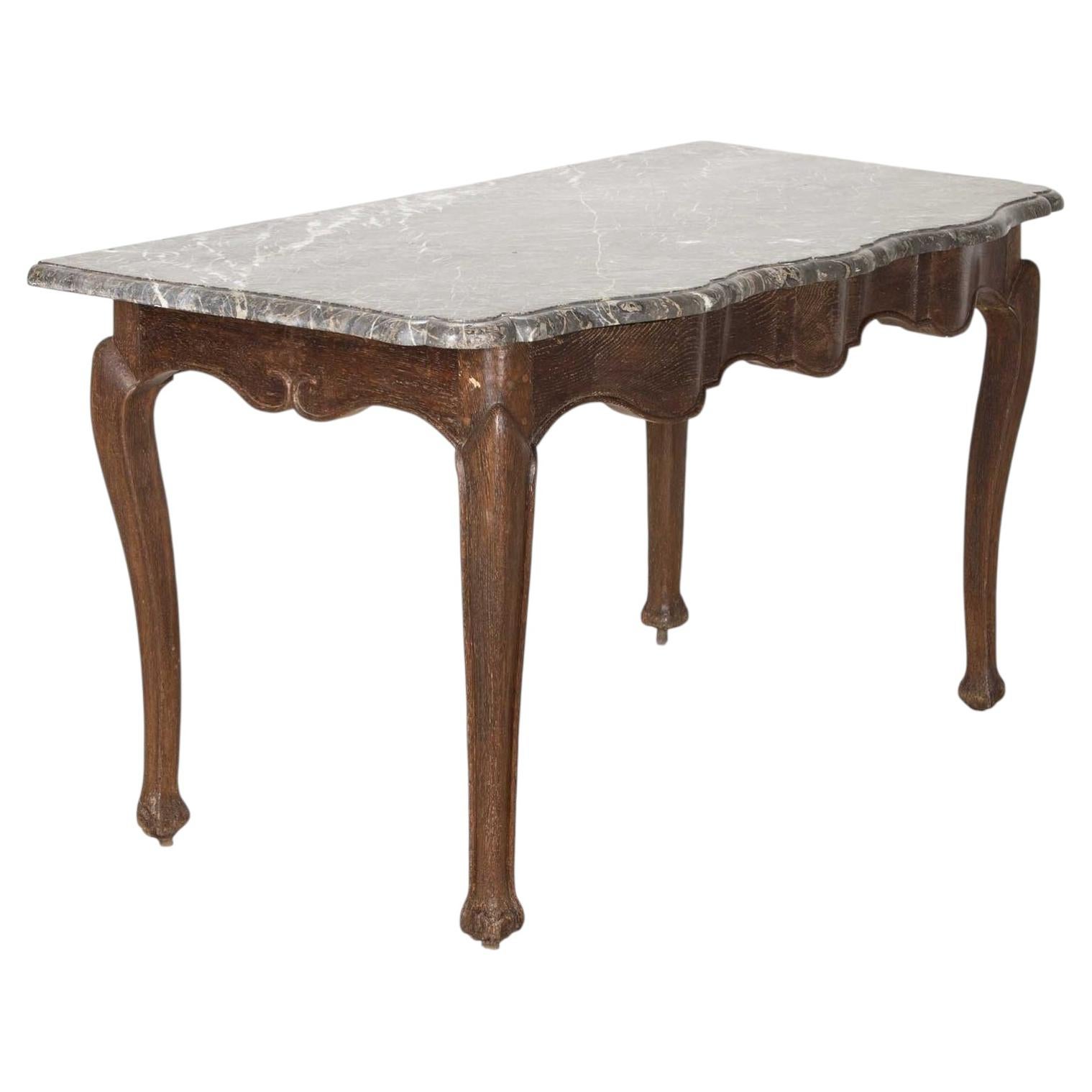 Mesa consola francesa de principios del siglo XVIII con tablero de mármol en venta