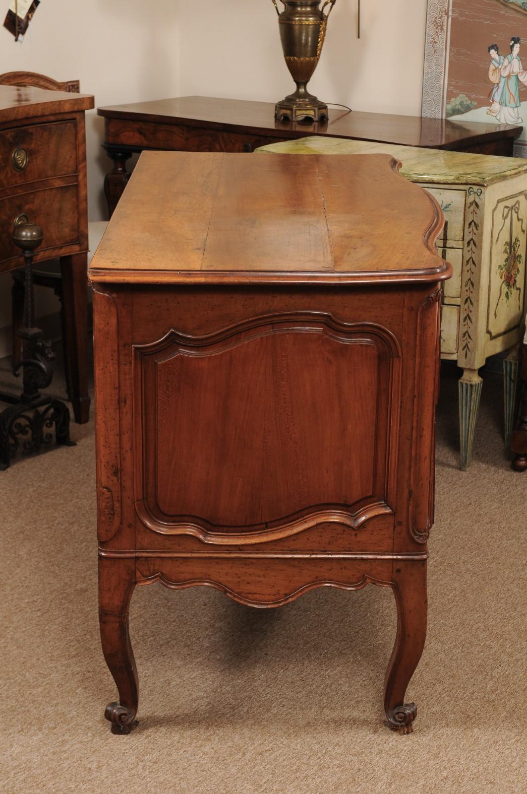 18th Century and Earlier Early 18th Century French Regence Commode in Fruitwood For Sale
