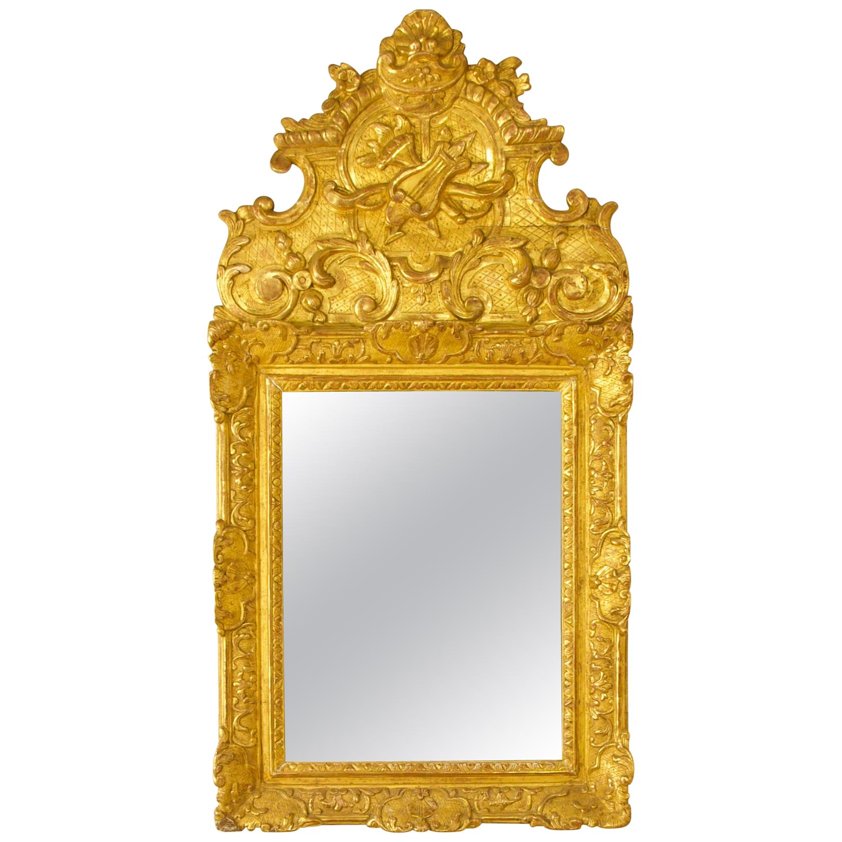 Early 18th Century French Regence Love Symbol Giltwood Mirror