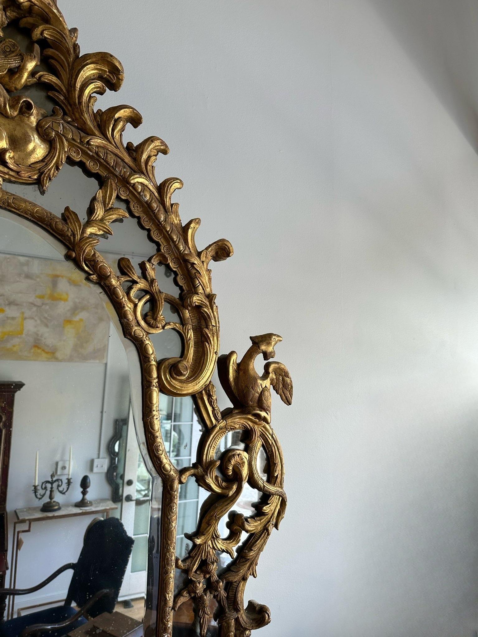 Early 18th Century French Regence Period Carved Gilt Mirror In Good Condition For Sale In Middleburg, VA