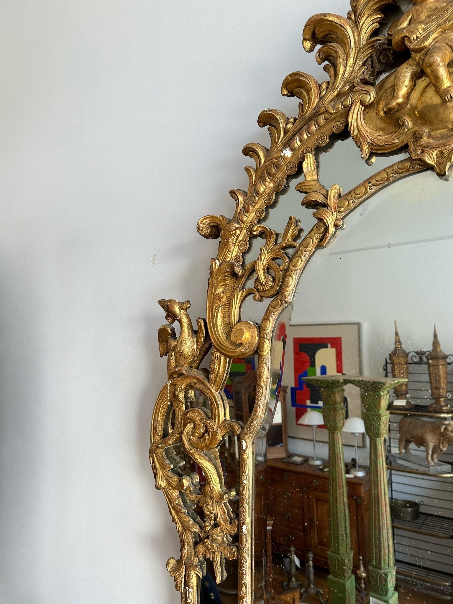 Giltwood Early 18th Century French Regence Period Carved Gilt Mirror For Sale