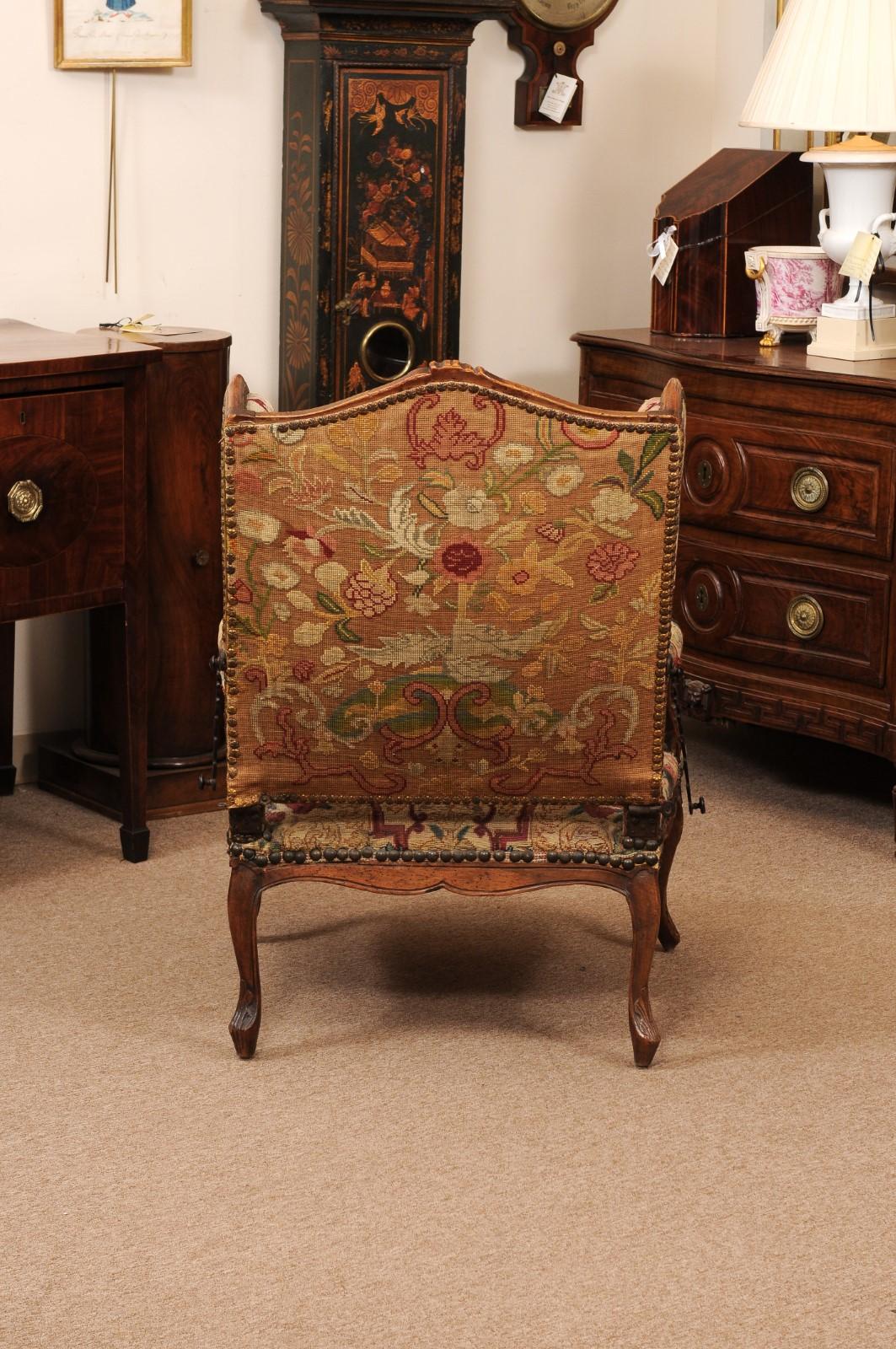 Early 18th Century French Regence Period Walnut Ratchet Wing Chair with Needlewo For Sale 5