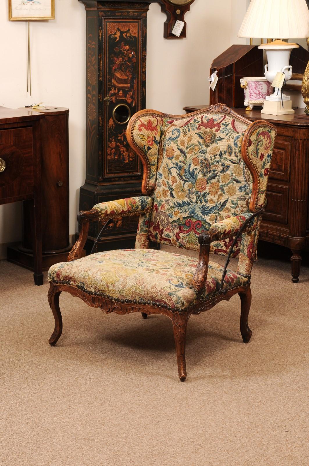 Early 18th Century French Regence Period Walnut Ratchet Wing Chair with Needlewo For Sale 8