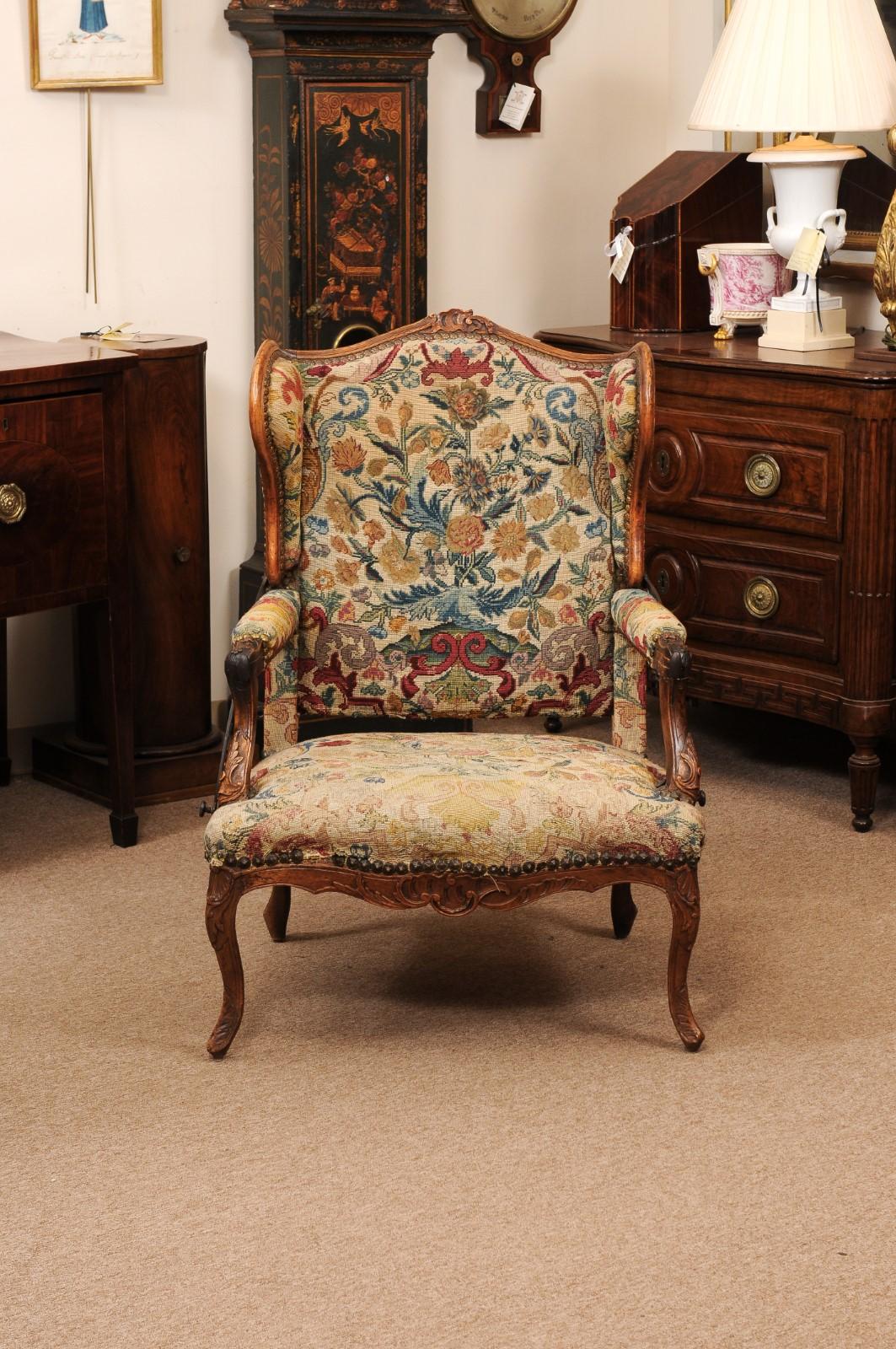 Early 18th Century French Regence Period Walnut Ratchet Wing Chair with Needlewo For Sale 9