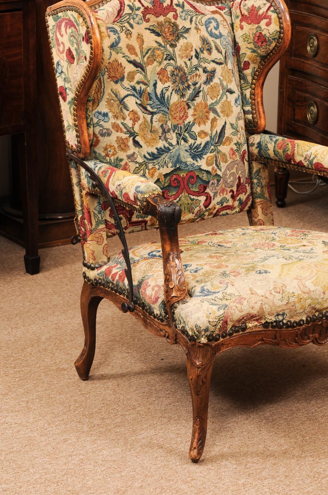 Regency Early 18th Century French Regence Period Walnut Ratchet Wing Chair with Needlewo For Sale