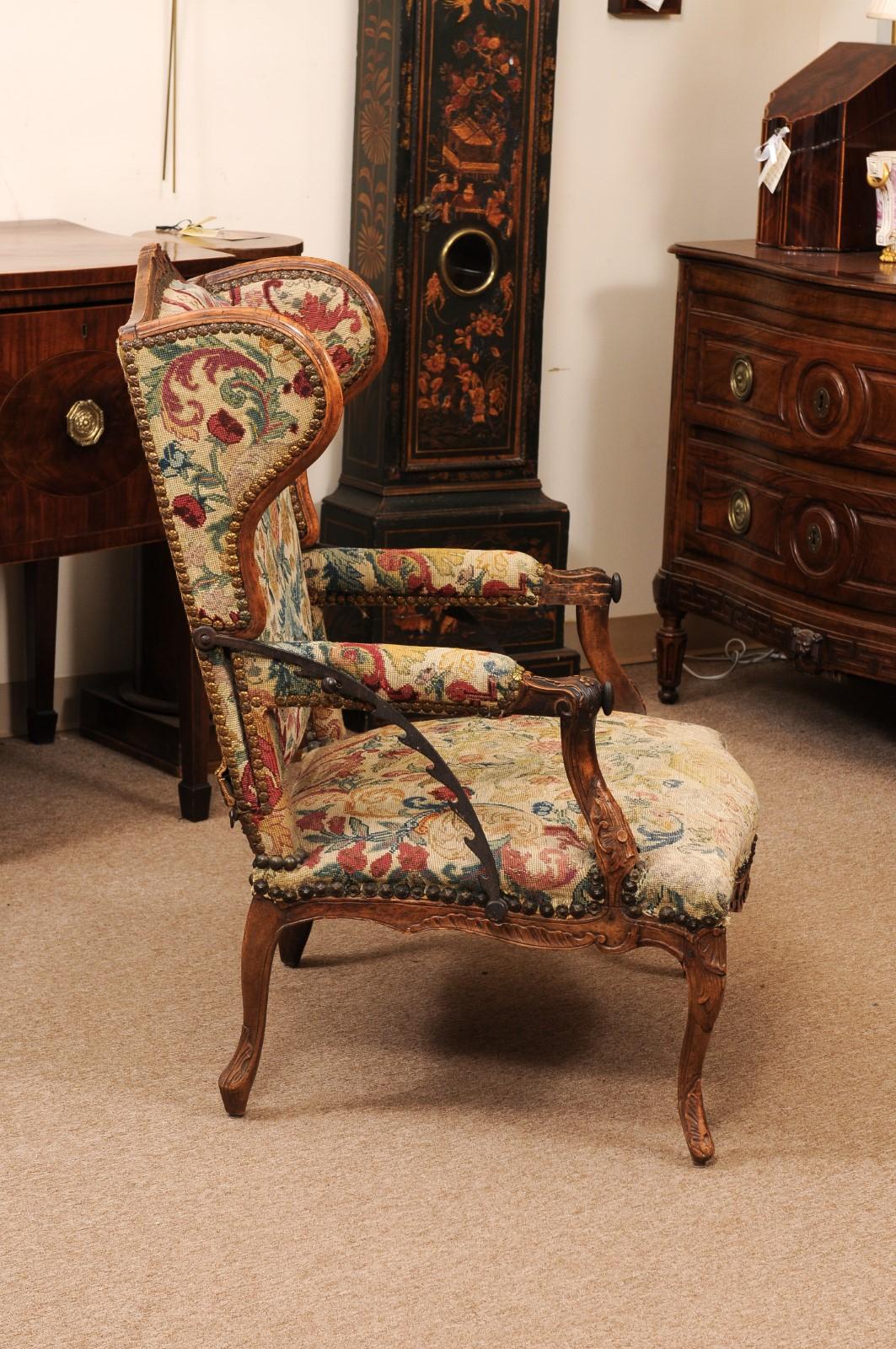 Early 18th Century French Regence Period Walnut Ratchet Wing Chair with Needlewo For Sale 3