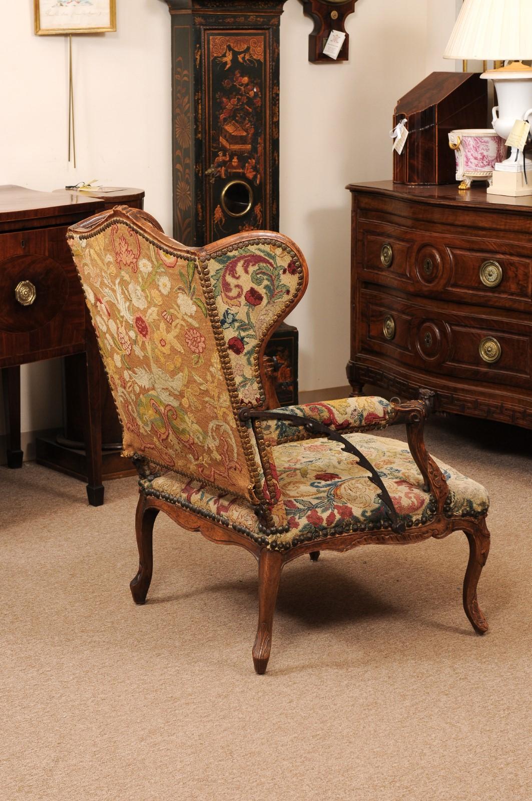 Early 18th Century French Regence Period Walnut Ratchet Wing Chair with Needlewo For Sale 4