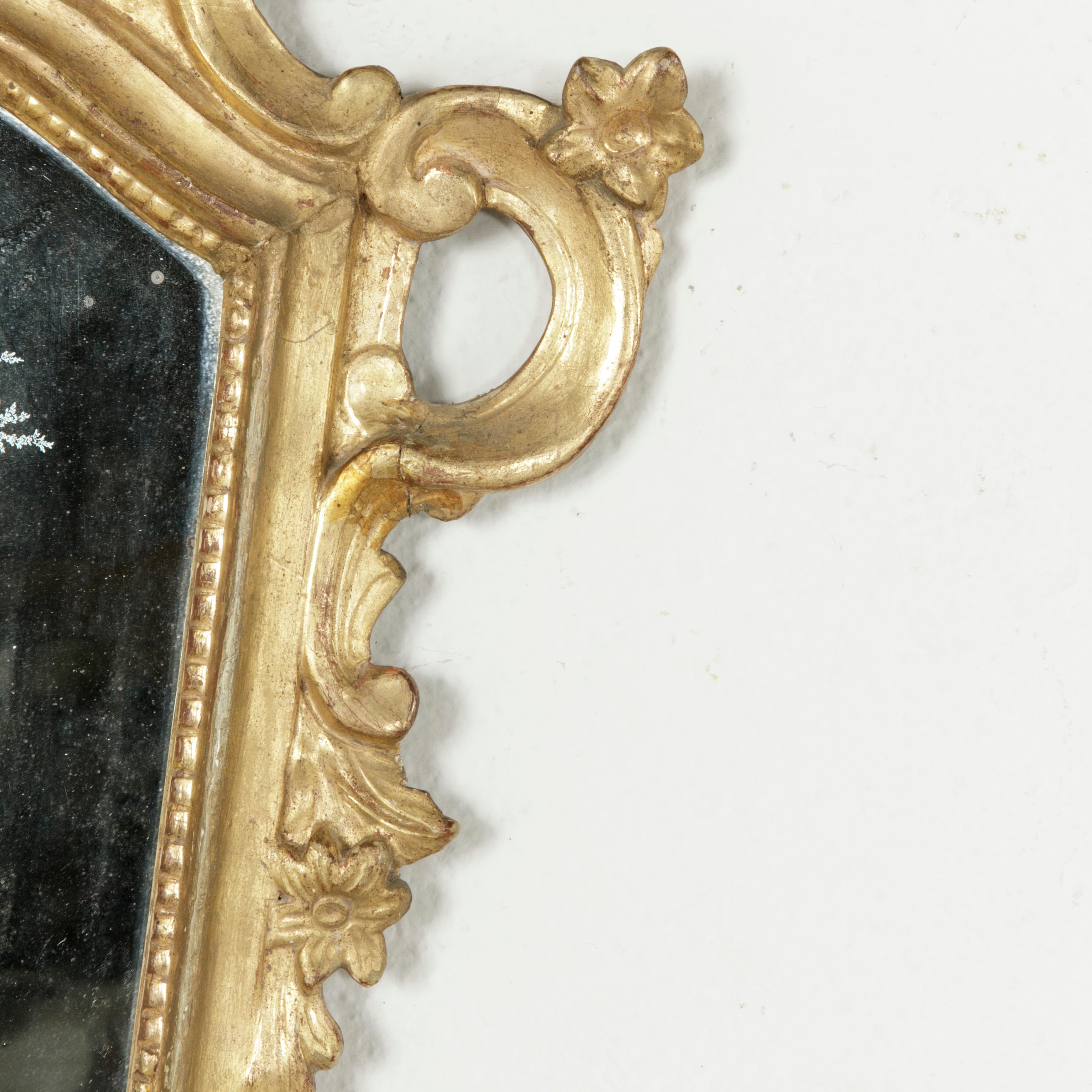 Early 18th Century French Regency Period Giltwood Mirror with Mercury Glass 3
