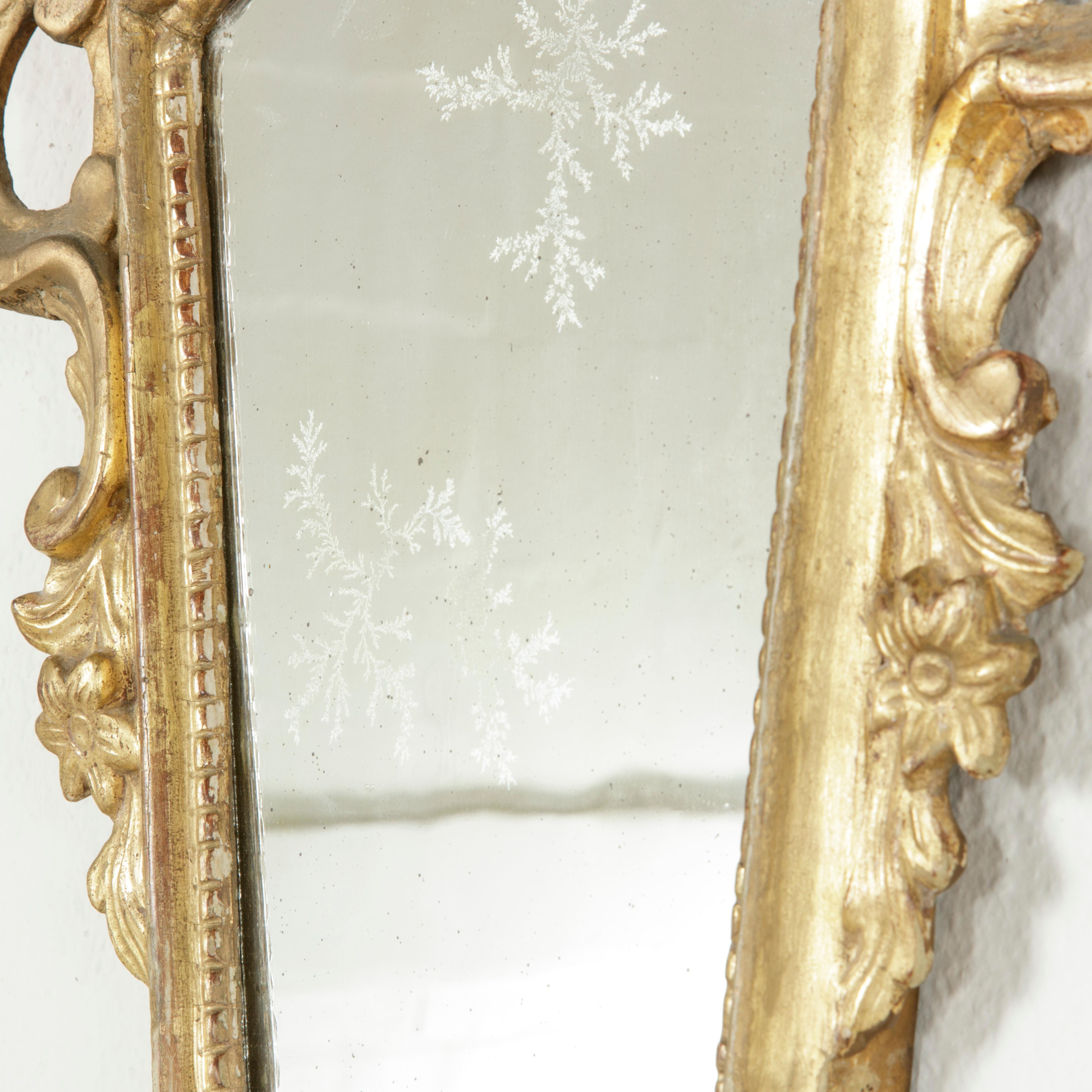 Early 18th Century French Regency Period Giltwood Mirror with Mercury Glass 4