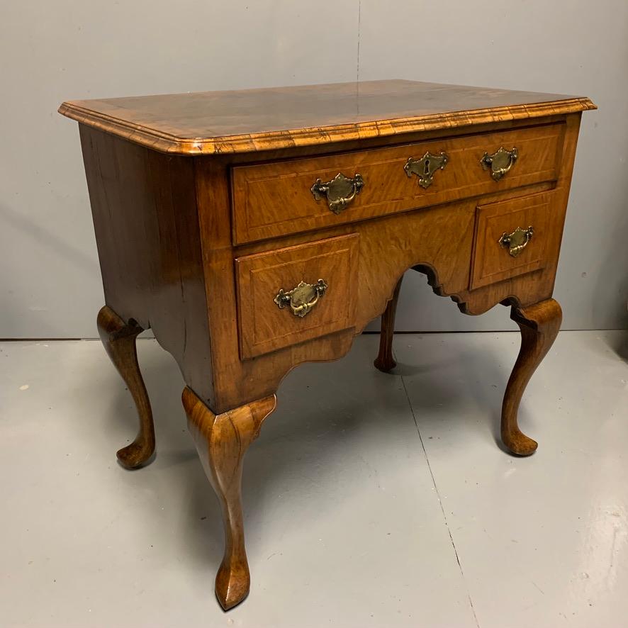 Mid-18th Century Early 18th Century George I Walnut Lowboy with Pointed Pad Feet For Sale