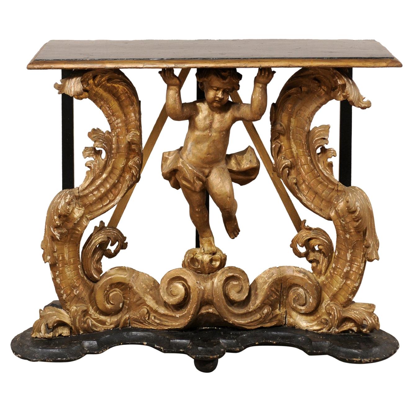 Table console rococo italienne du début du 18e siècle avec un putto magnifiquement sculpté