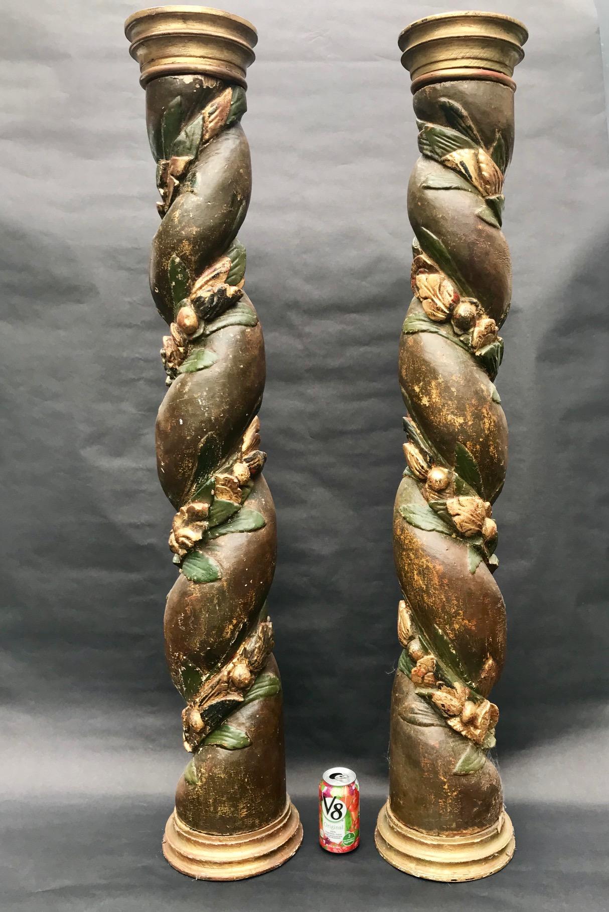 Early 18th Century Large Pair of Wood Carved French Baroque Solomonic Columns  

These beautiful and rare carvings are polychrome and gilded. The columns are graduated. Decorative carvings, composed of fruits, grapes and vine leaves, spirally turn