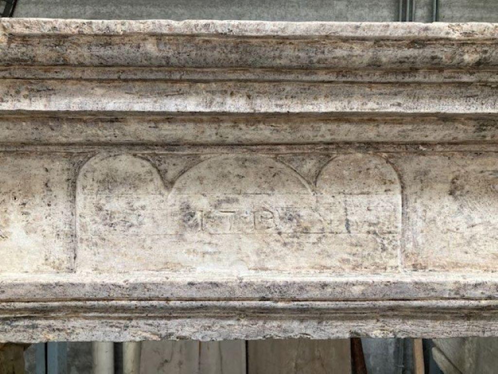 Louis XIII Early 18th Century Limestone Fireplace Mantel with Date Inscription '1713' For Sale