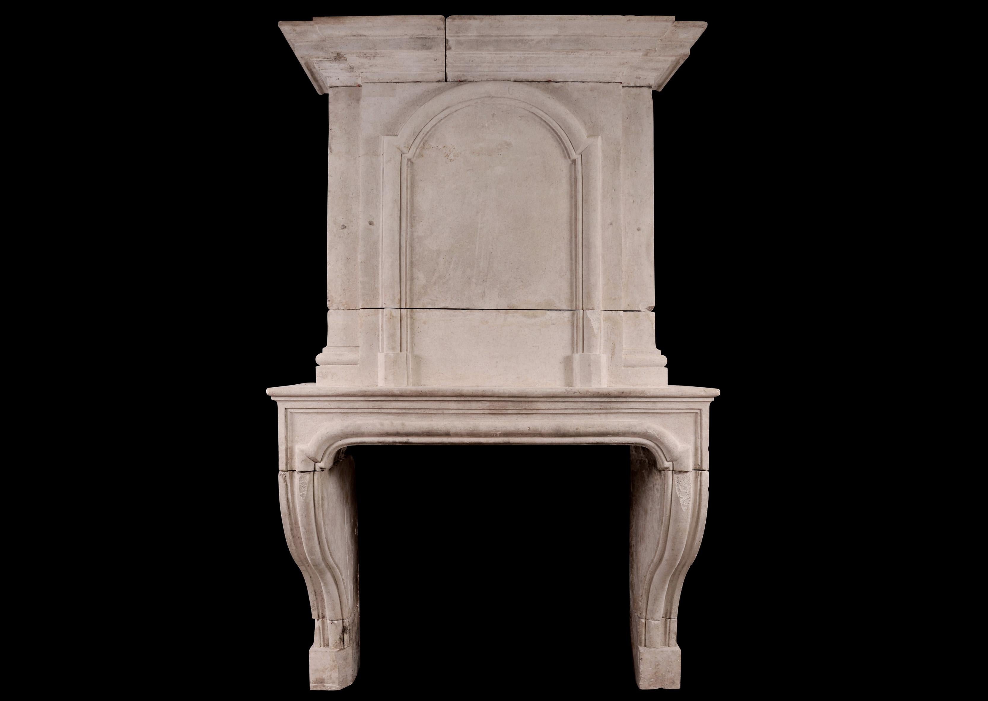 Early 18th Century Louis XIV Limestone Fireplace with Pannelled Trumeau In Good Condition In London, GB