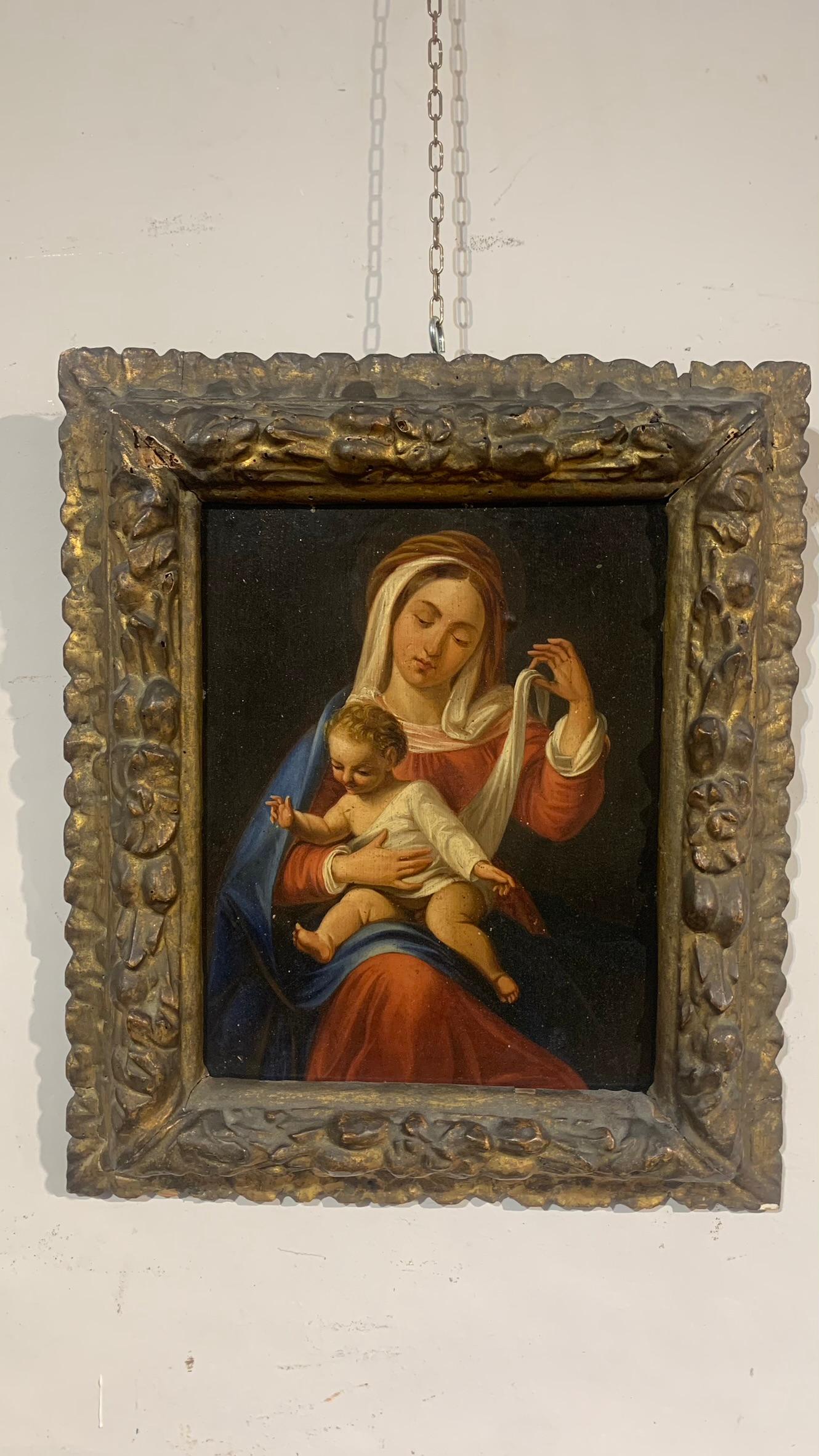 Beautiful oil painting on panel depicting the Madonna with Child in a carved and gilded wooden frame.
Work of a Piedmontese artist from the early 1700s.

MEASURES: Light 28x22 cm, Overall 43x36 cm.