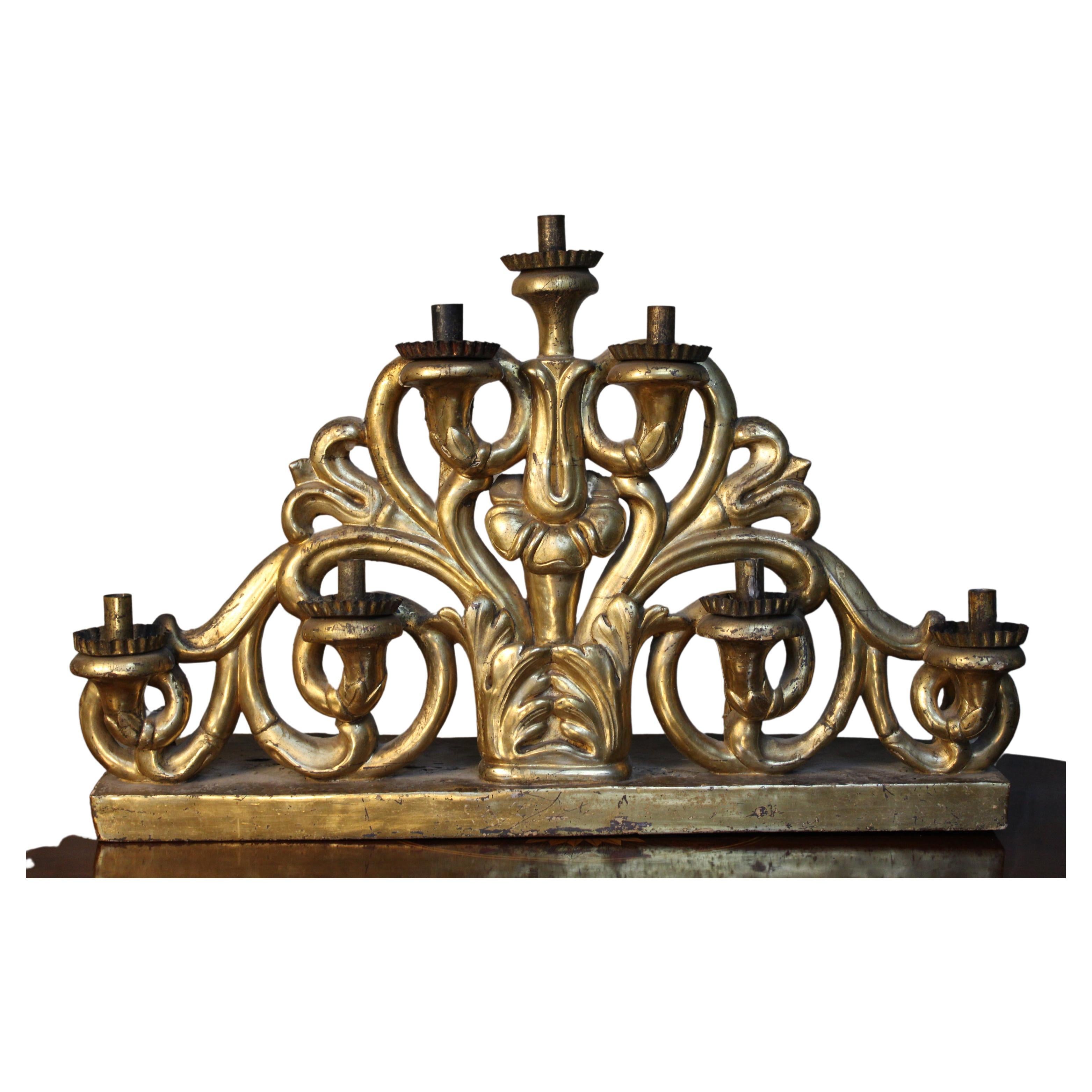Early 17th century magnificent carved gild-wood candelabra baroque 1660s Italy 
Original gilded wood and very beautiful piece of art .generally in good condition with signs of agings as shown on the photos. may needs some restorations.
