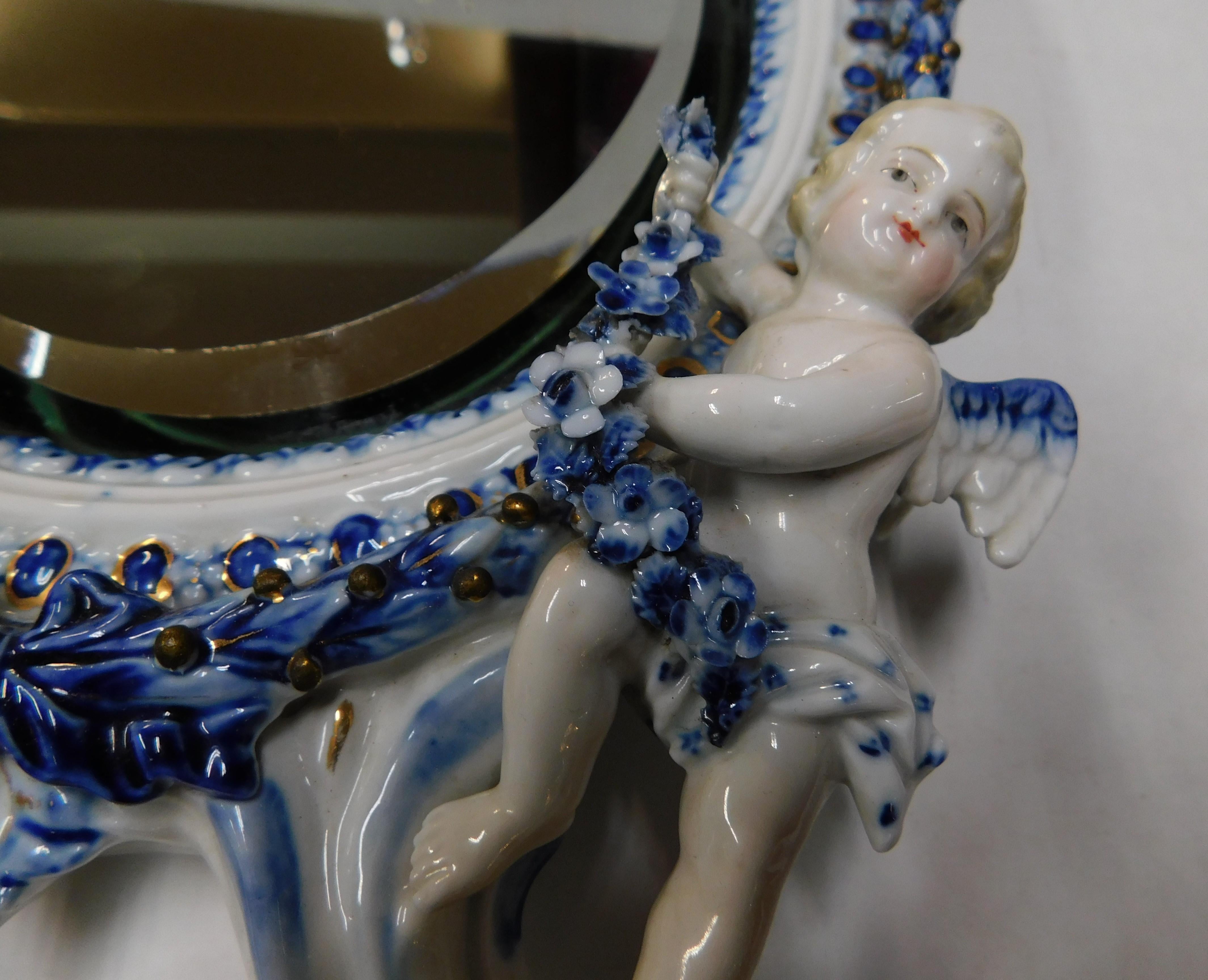 Early 18th Century Meissen Oval Wall Beveled Mirror Pair of Cherubs, Germany In Good Condition For Sale In Hamilton, Ontario