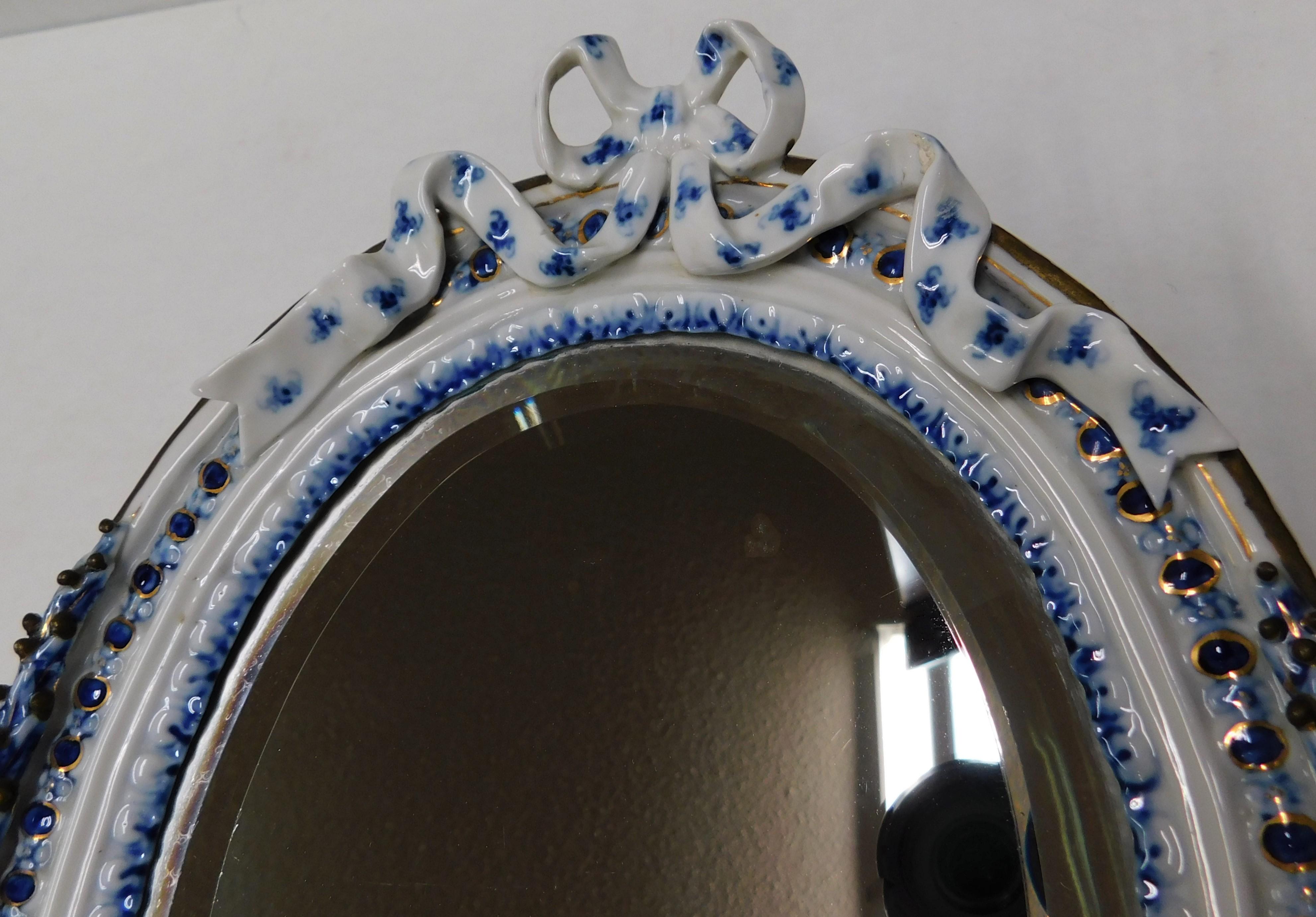 Espejo biselado de pared ovalado de Meissen de principios del siglo XVIII Pareja de querubines, Alemania en venta 1