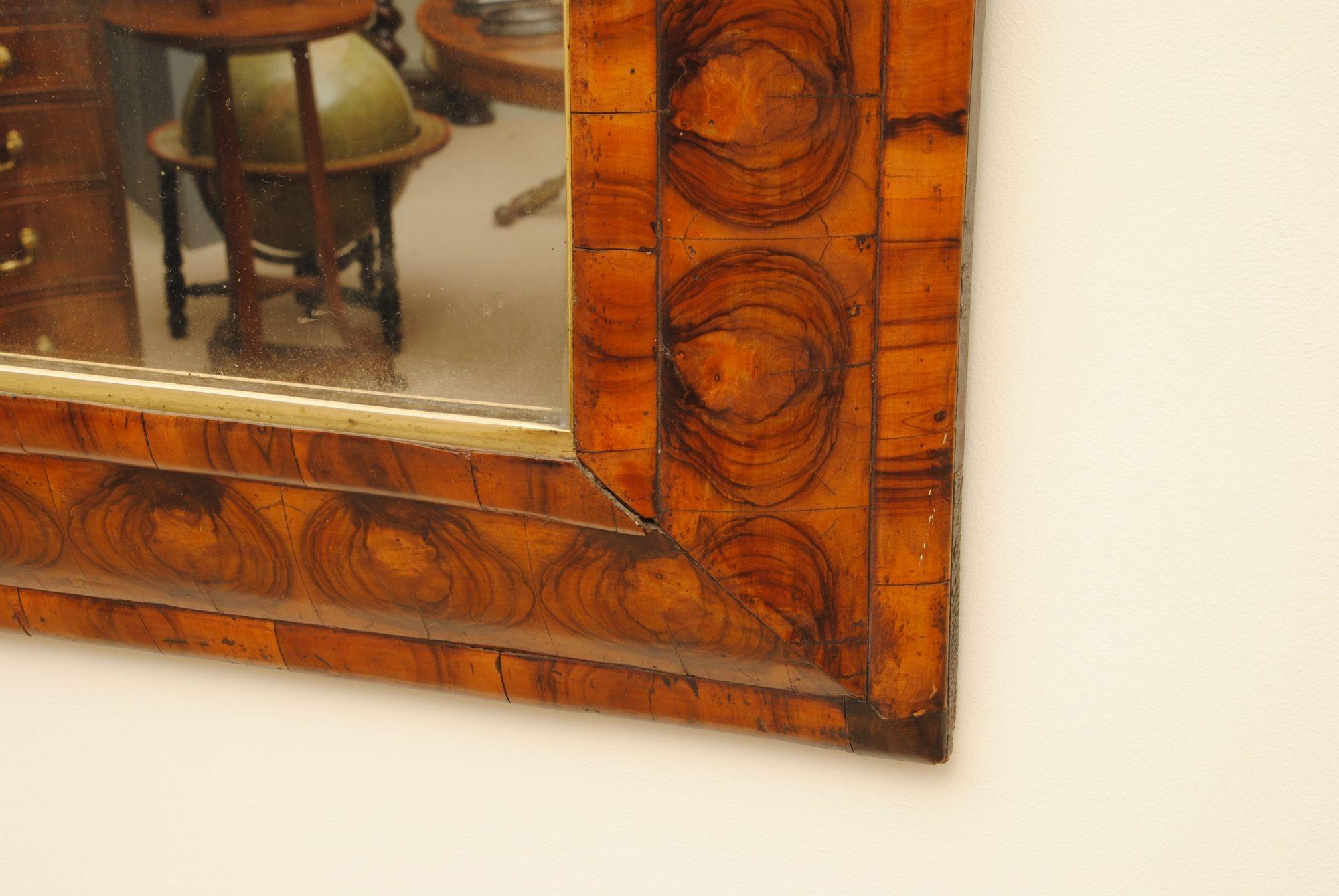 European Early 18th Century Oyster Veneer Cushion Mirror For Sale