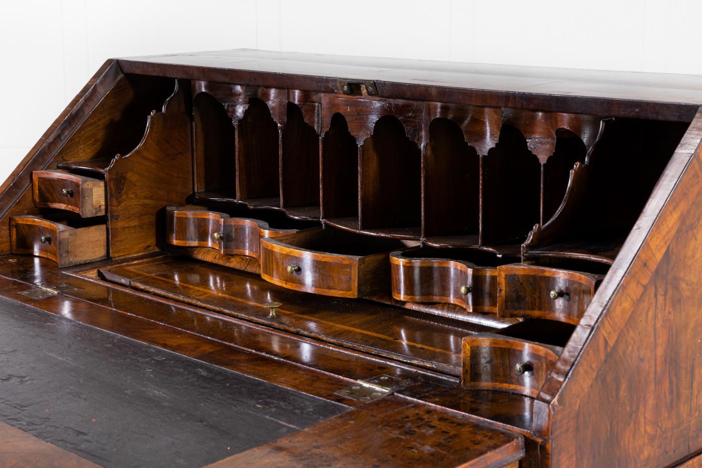 Early 18th century Queen Anne walnut bureau with one of the finest interiors of this model.