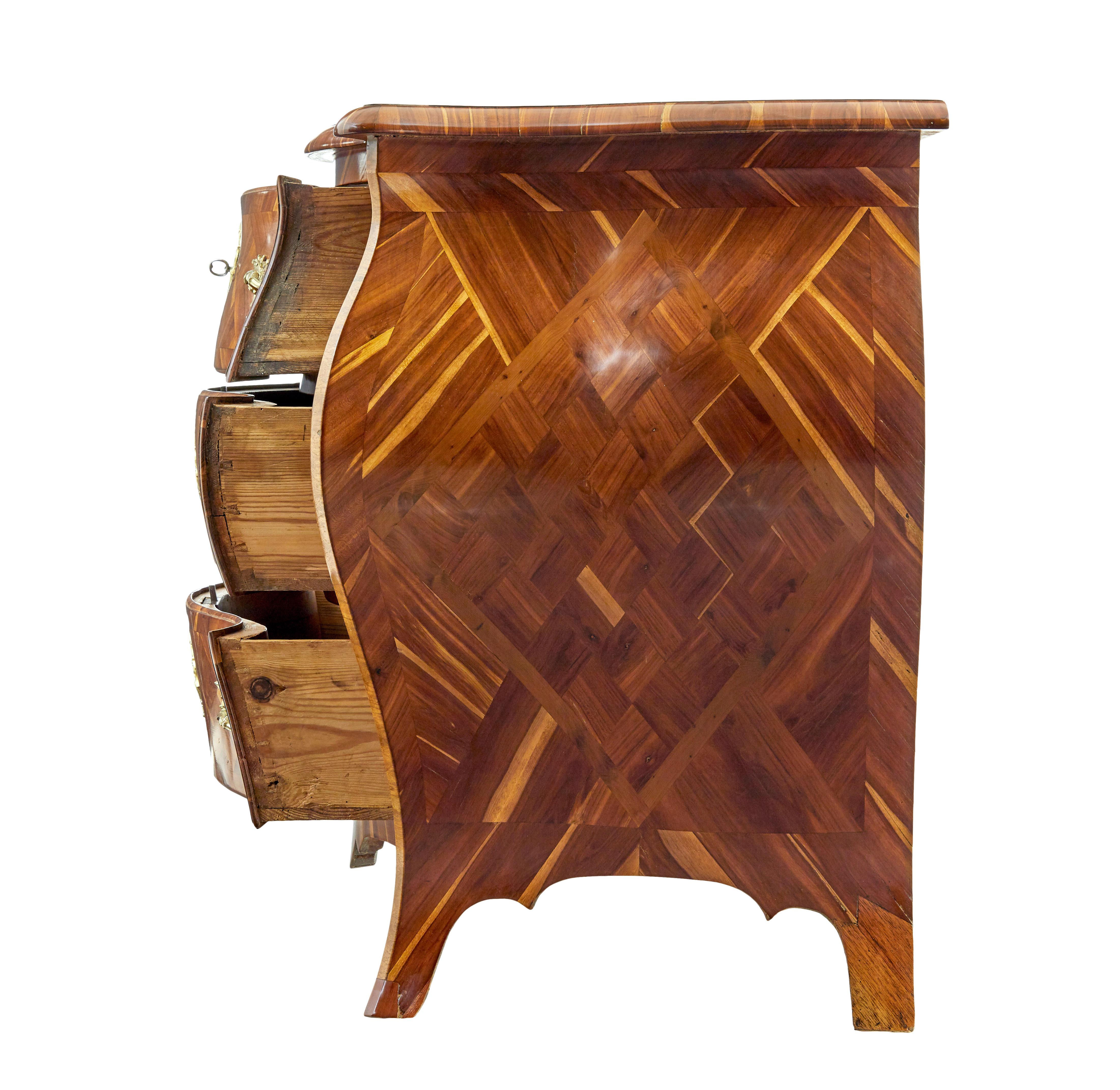 Hand-Carved Early 18th century Rococo inlaid plum bombe chest of drawers