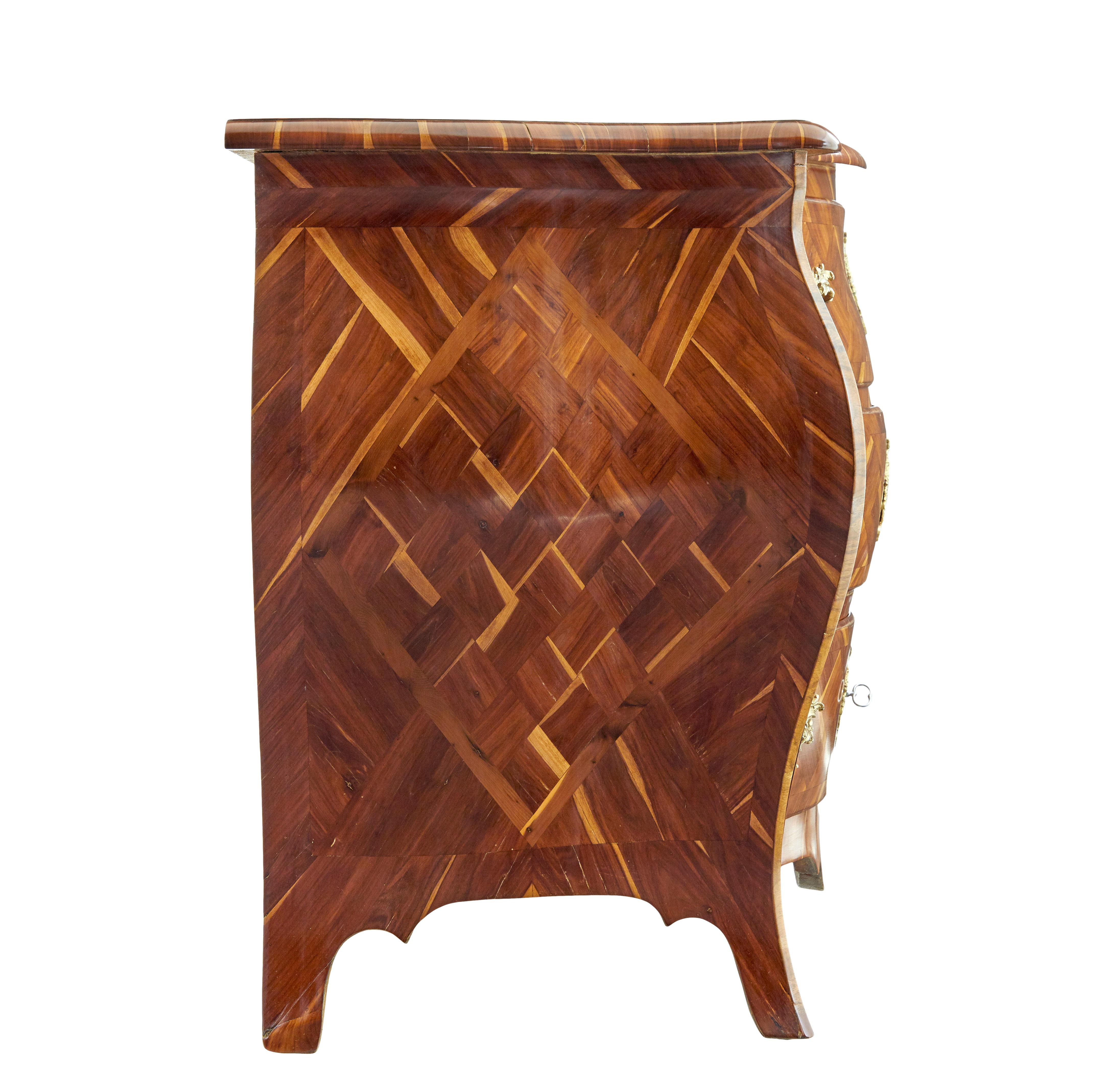 18th Century Early 18th century Rococo inlaid plum bombe chest of drawers