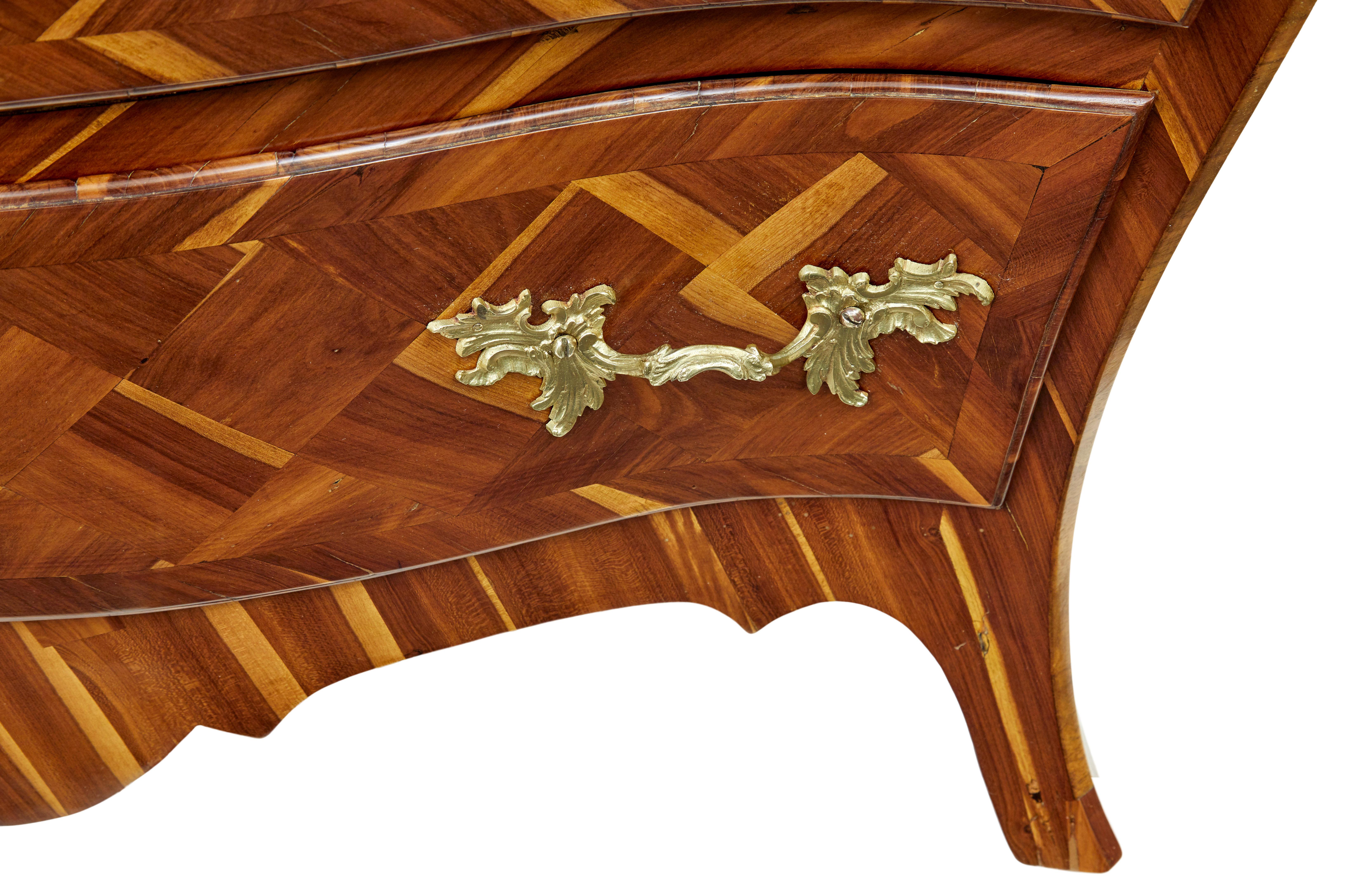 Fruitwood Early 18th century Rococo inlaid plum bombe chest of drawers