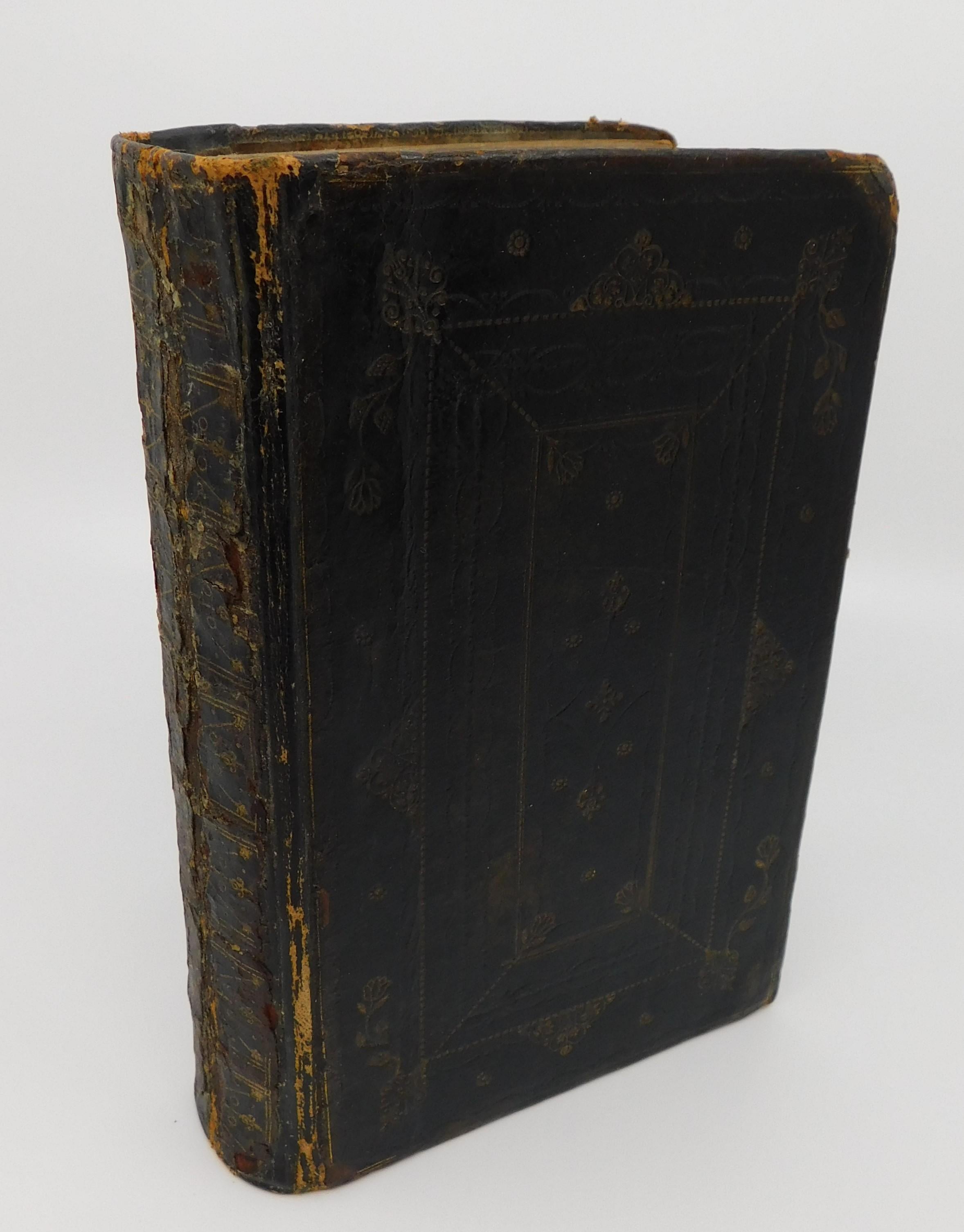 The Book of Common Prayer printed in 1707, printers to Queen Anne of Great Britain according to the Church of England, London. With lots of hand colored picture plates, leather bound cover. Good condition considering it is over 300 years old, see