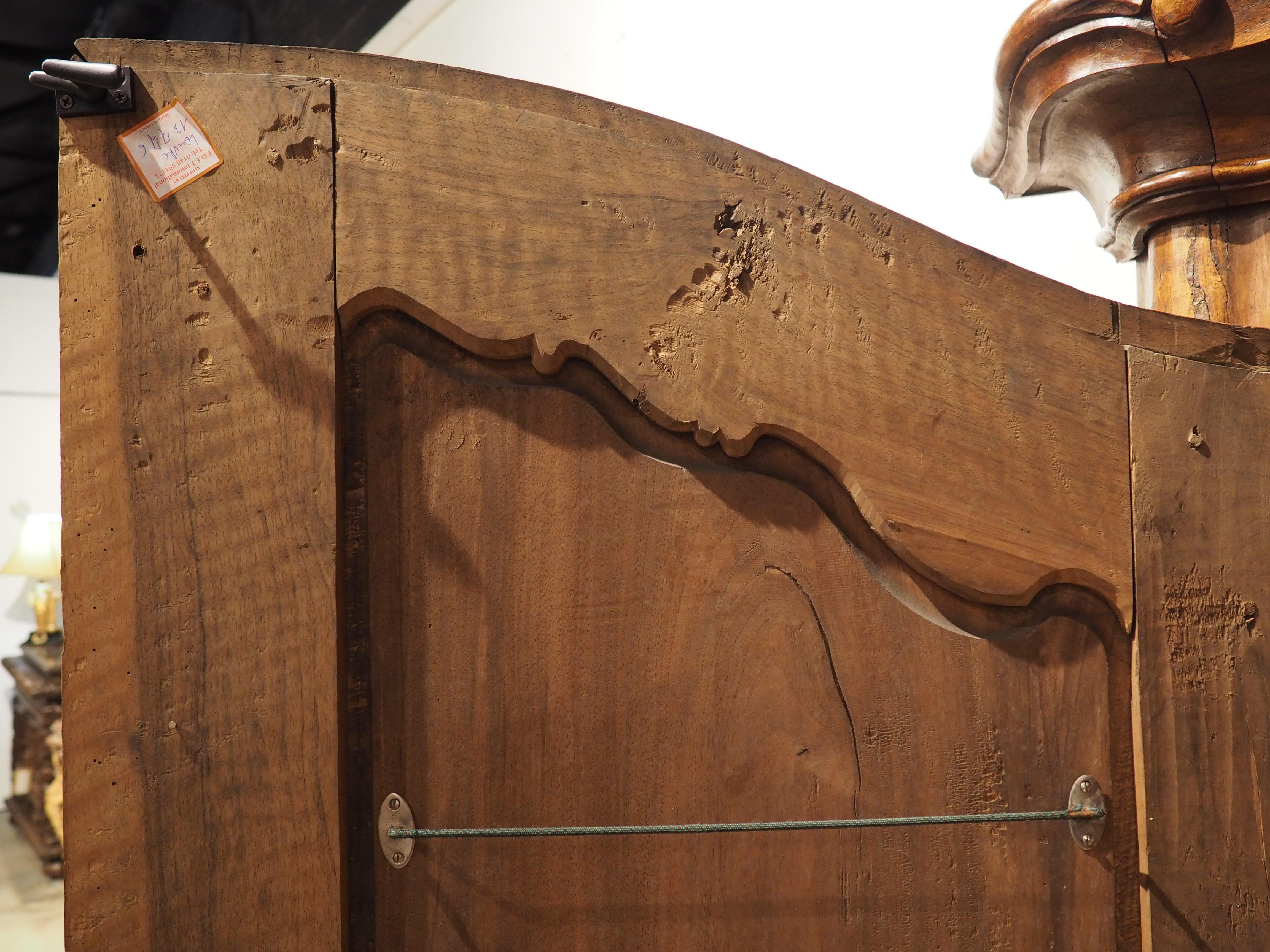 Early 18th Century Walnut and Olive Wood Armoire from Eastern France For Sale 9