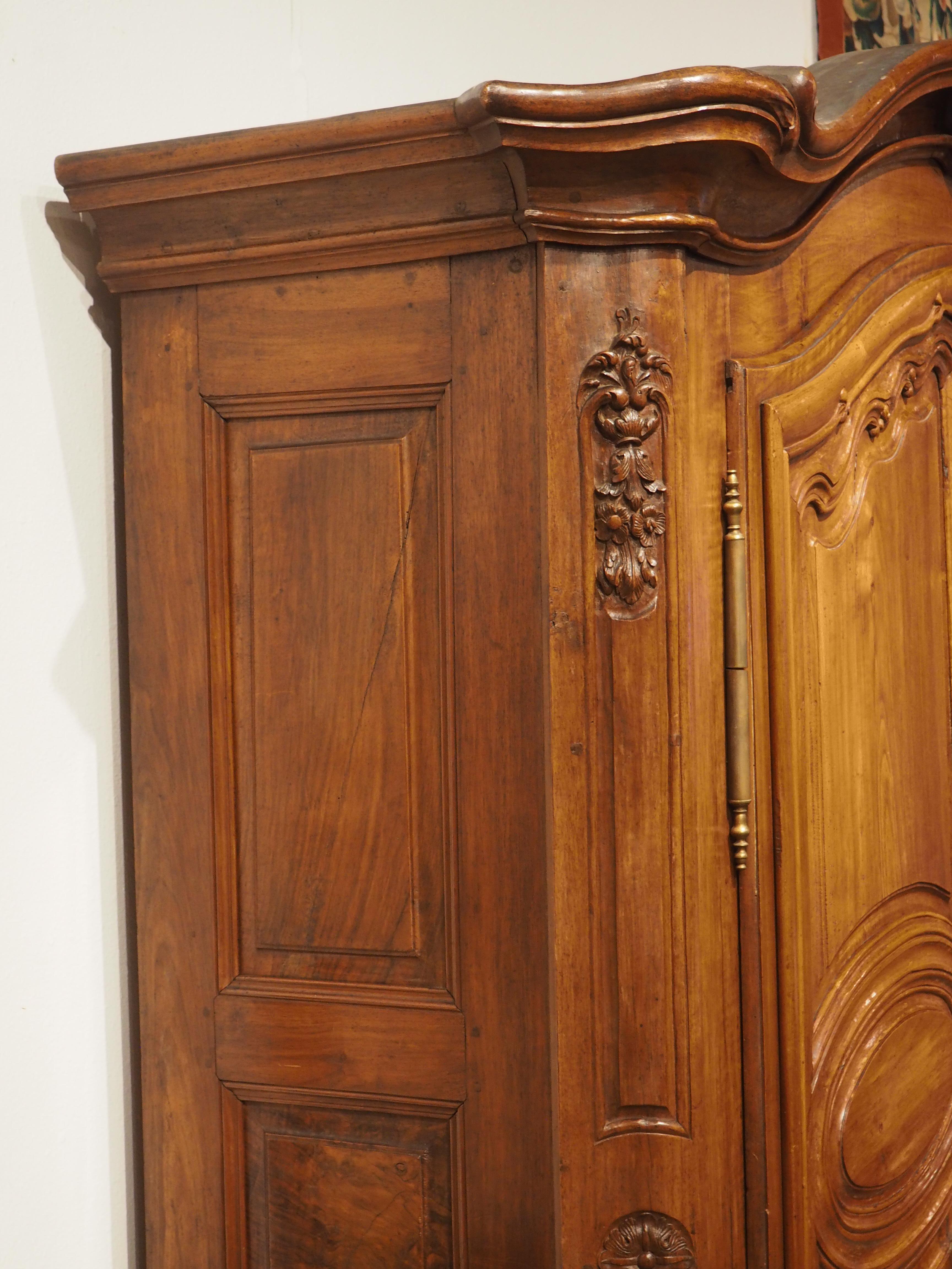French Early 18th Century Walnut and Olive Wood Armoire from Eastern France For Sale
