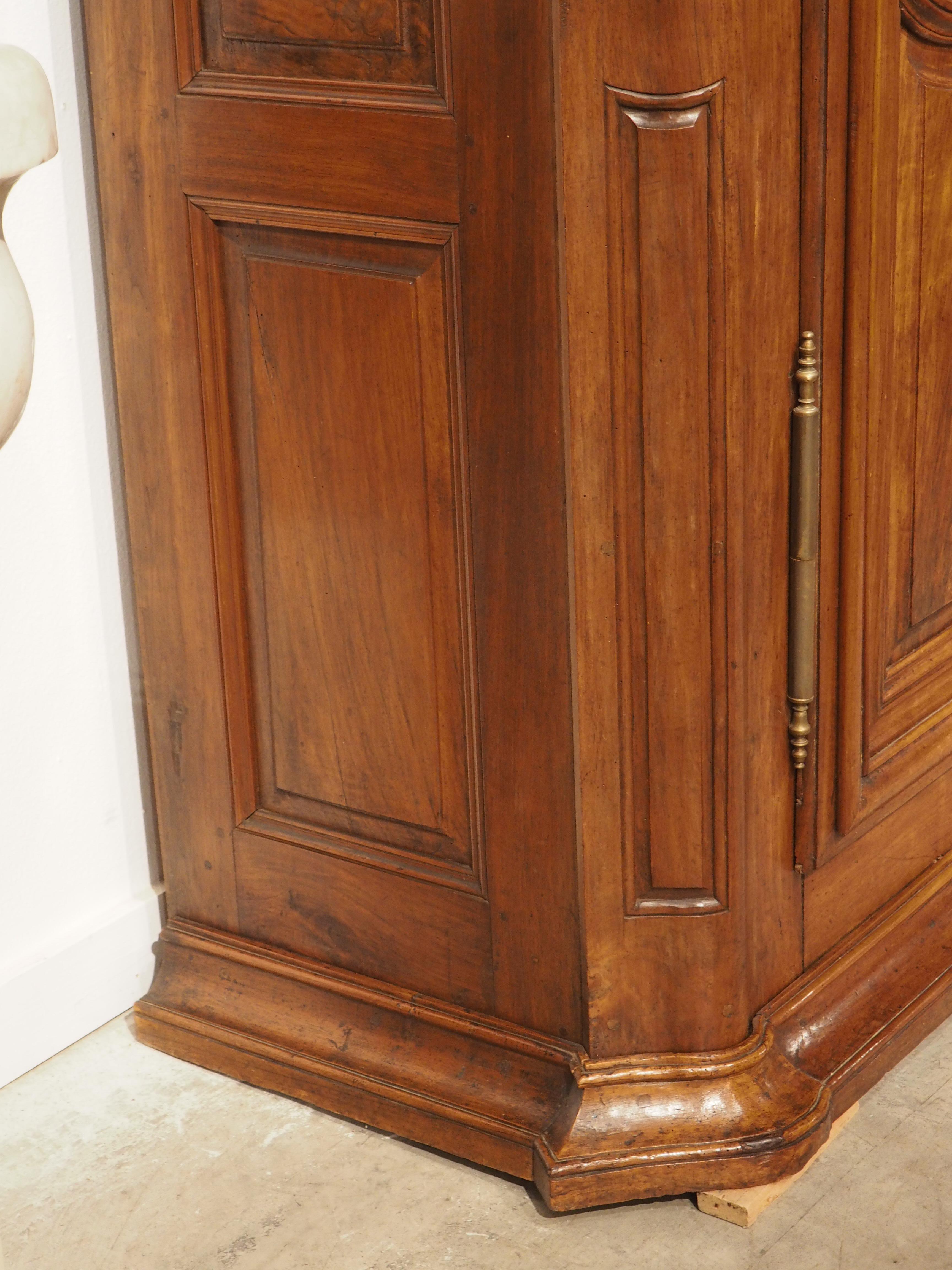 Hand-Carved Early 18th Century Walnut and Olive Wood Armoire from Eastern France For Sale
