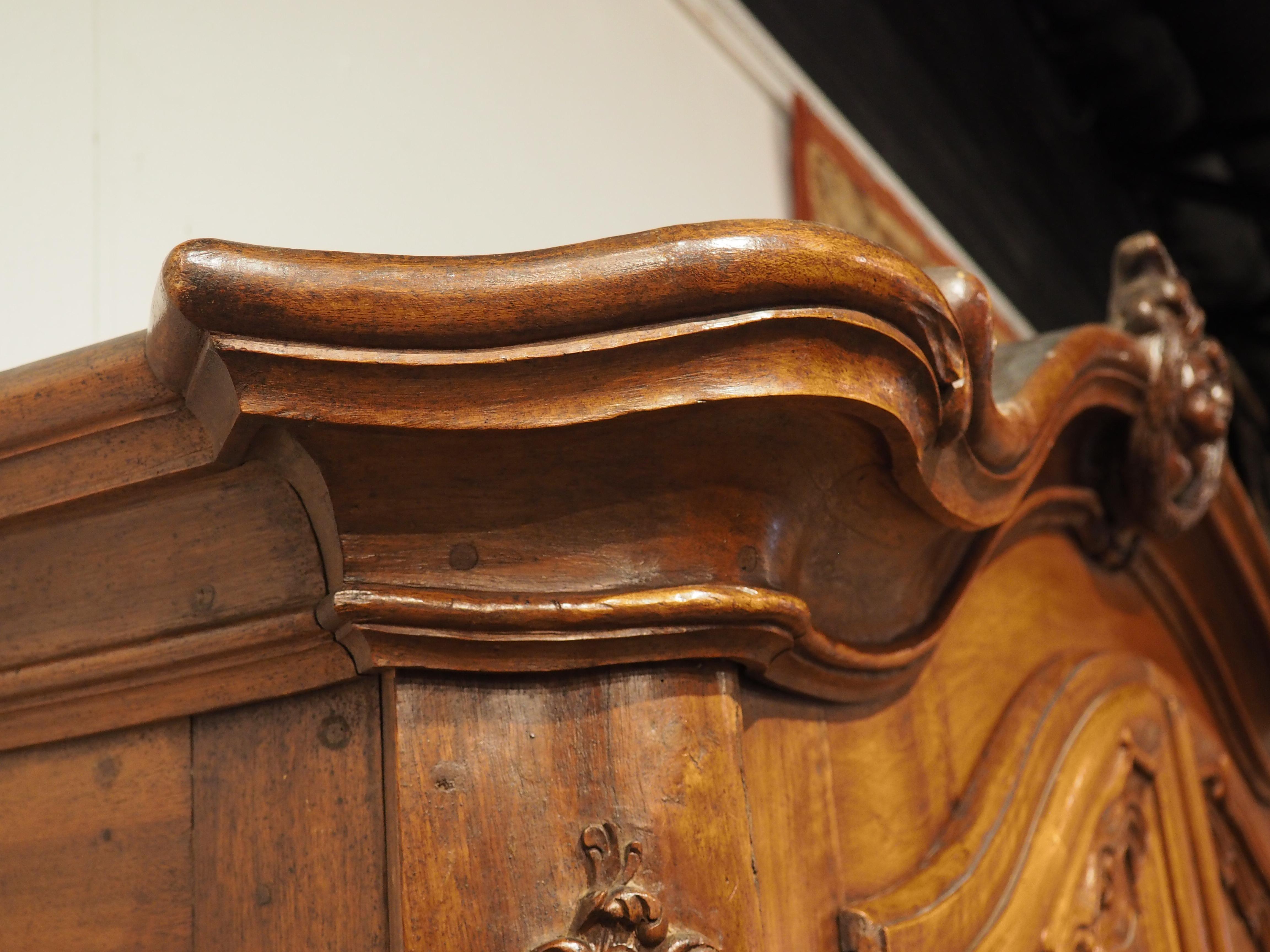 Early 18th Century Walnut and Olive Wood Armoire from Eastern France For Sale 1