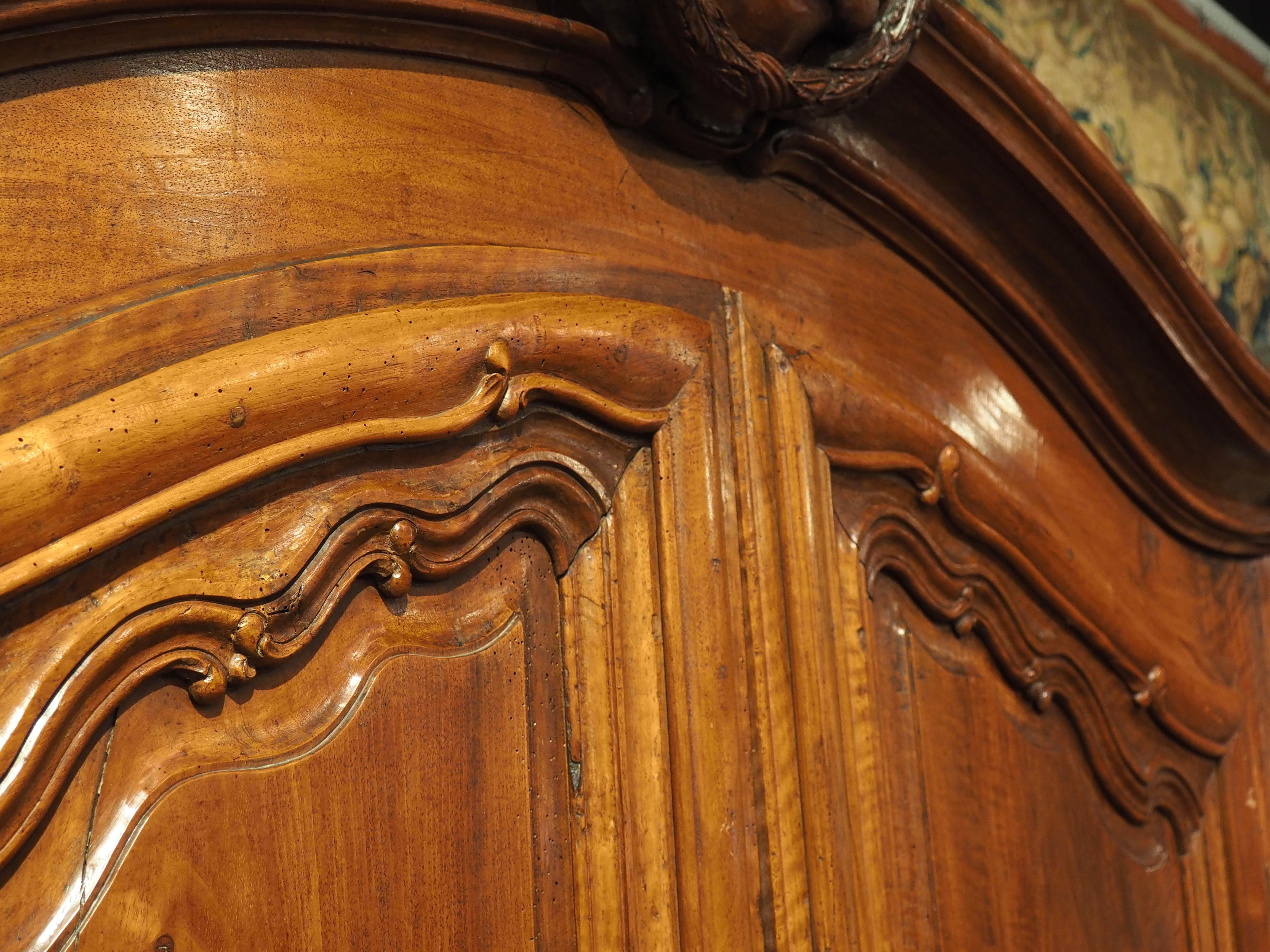 Early 18th Century Walnut and Olive Wood Armoire from Eastern France For Sale 2