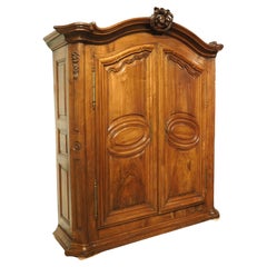 Early 18th Century Walnut and Olive Wood Armoire from Eastern France