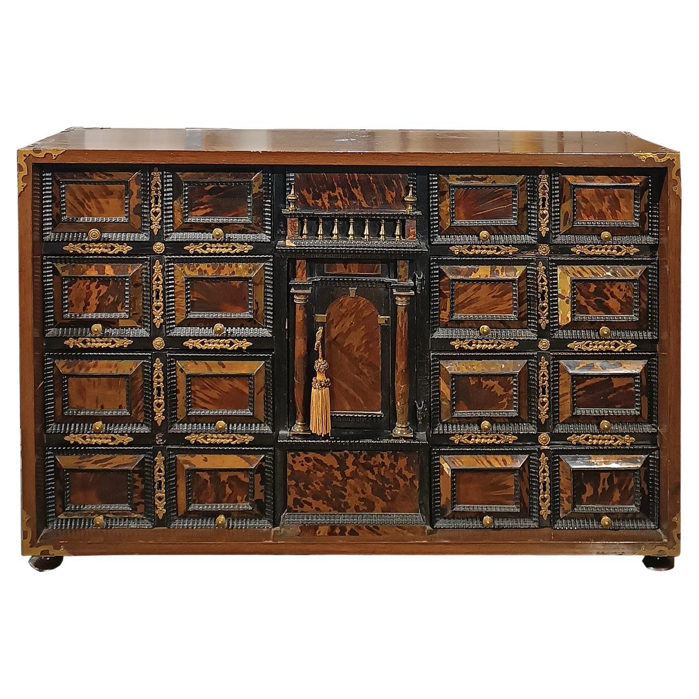 EARLY 18th CENTURY WALNUT COIN CABINET WITH FINISHES