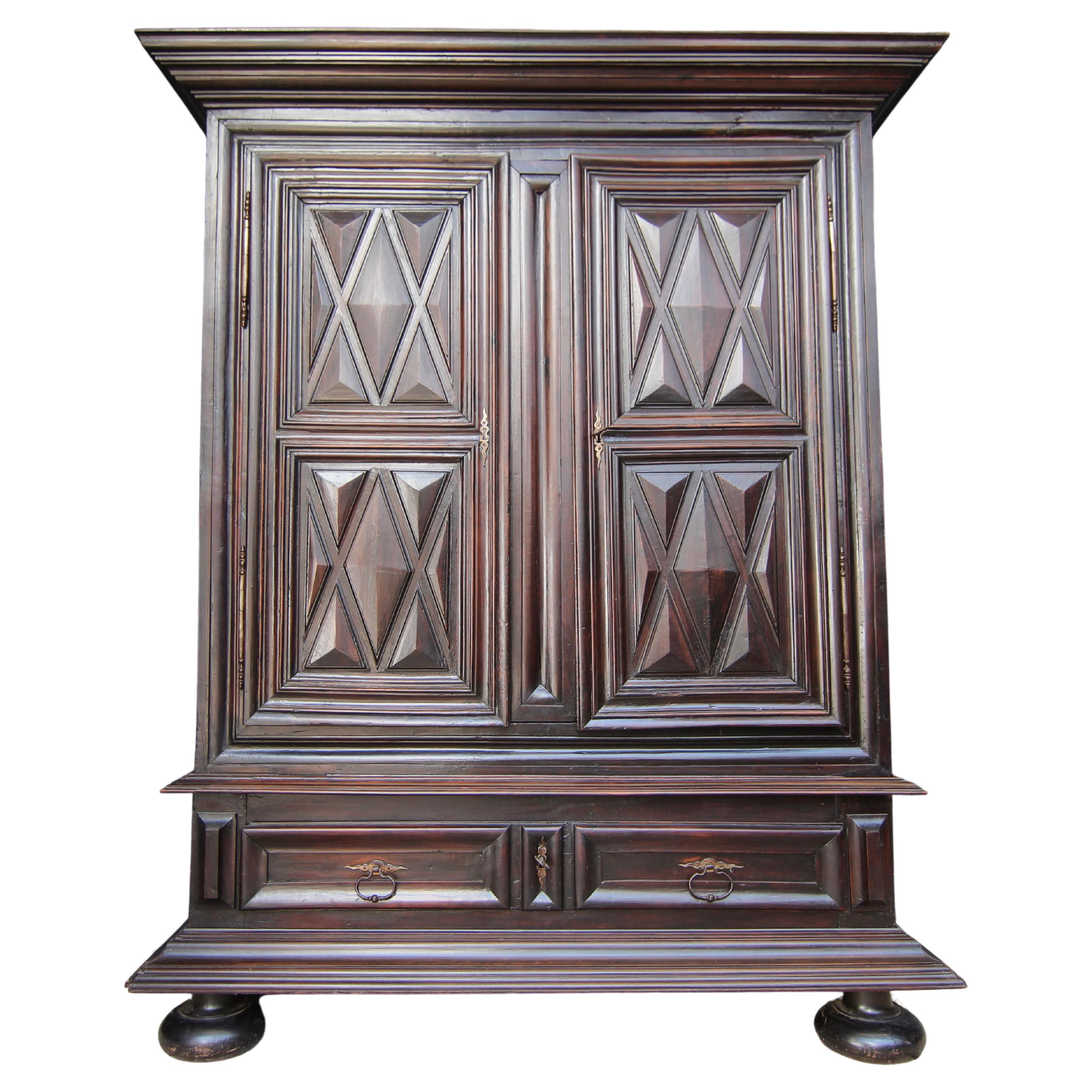 Early 18th Century Walnut Louis XII Armoire with Carved Diamond Point Panels