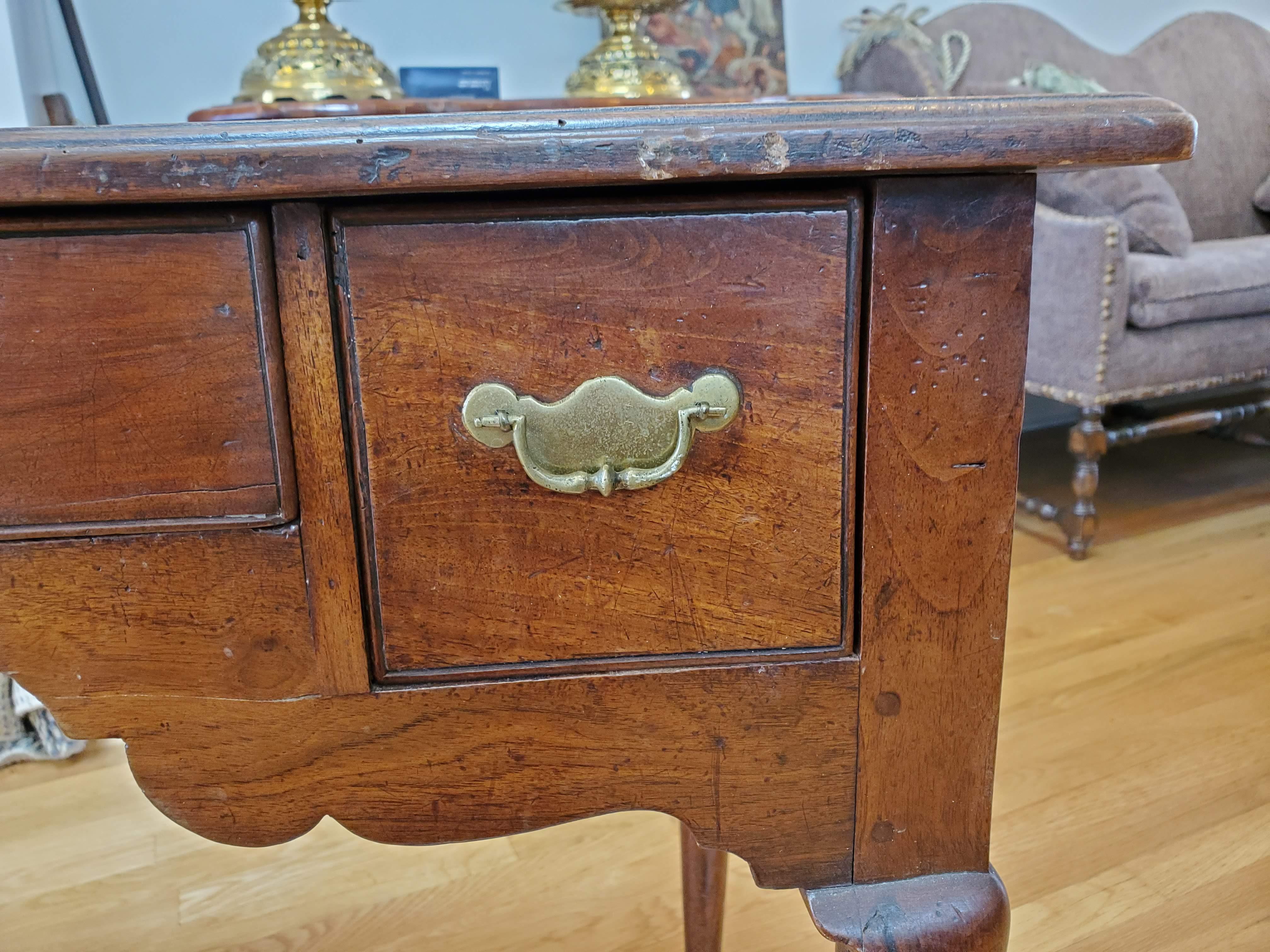 Brass Early 18th Century Walnut Lowboy Table with Three Drawers and Cabriole Legs For Sale