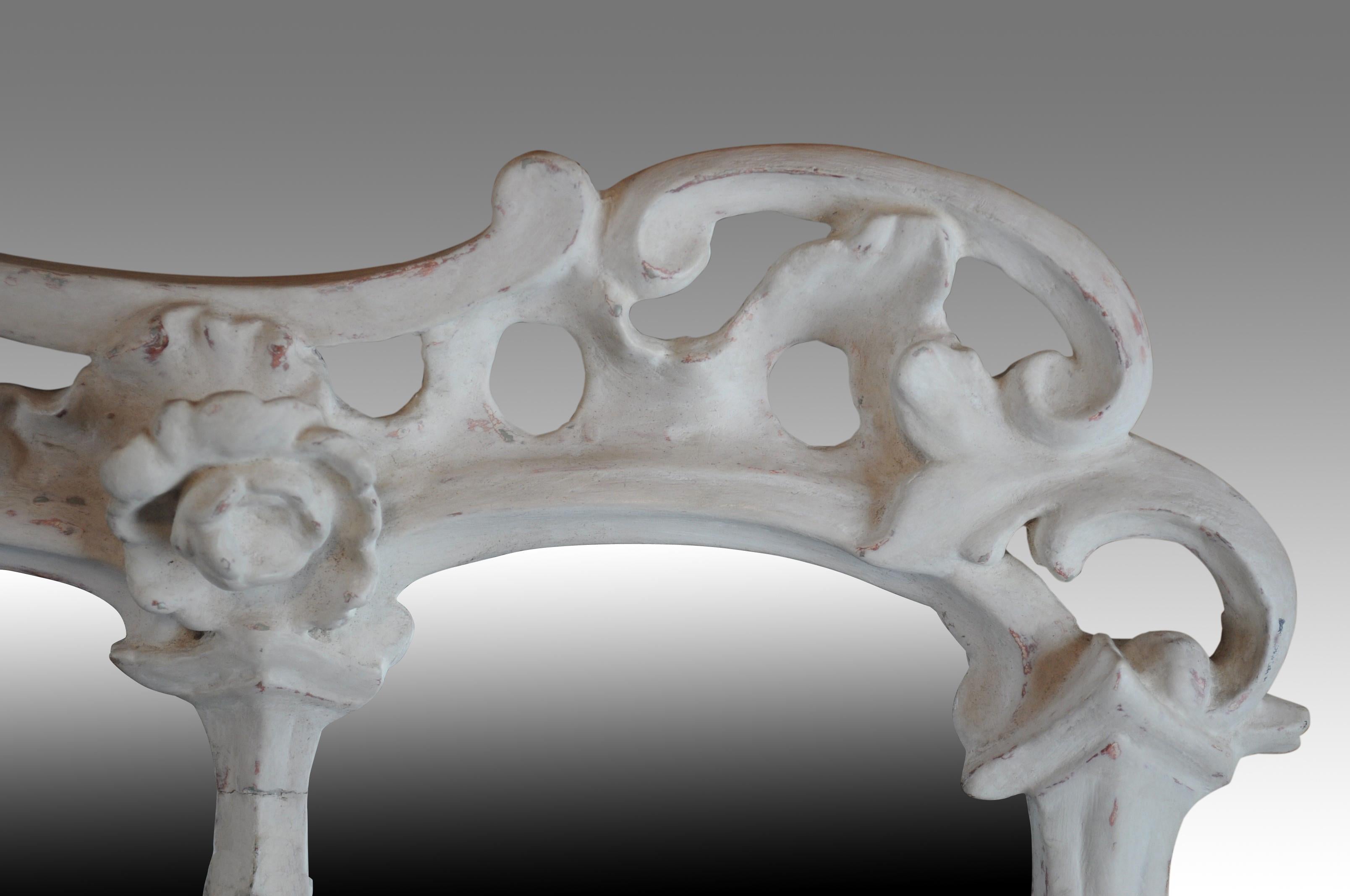 A good 18th century foliate carved three plate over-mantel mirror with carved scrolls, flowerheads and foliage.
Originally gilded, now painted. Later glass.