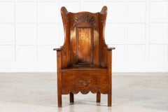 Silla de cordero tallada en roble y pino de principios del siglo XVIII