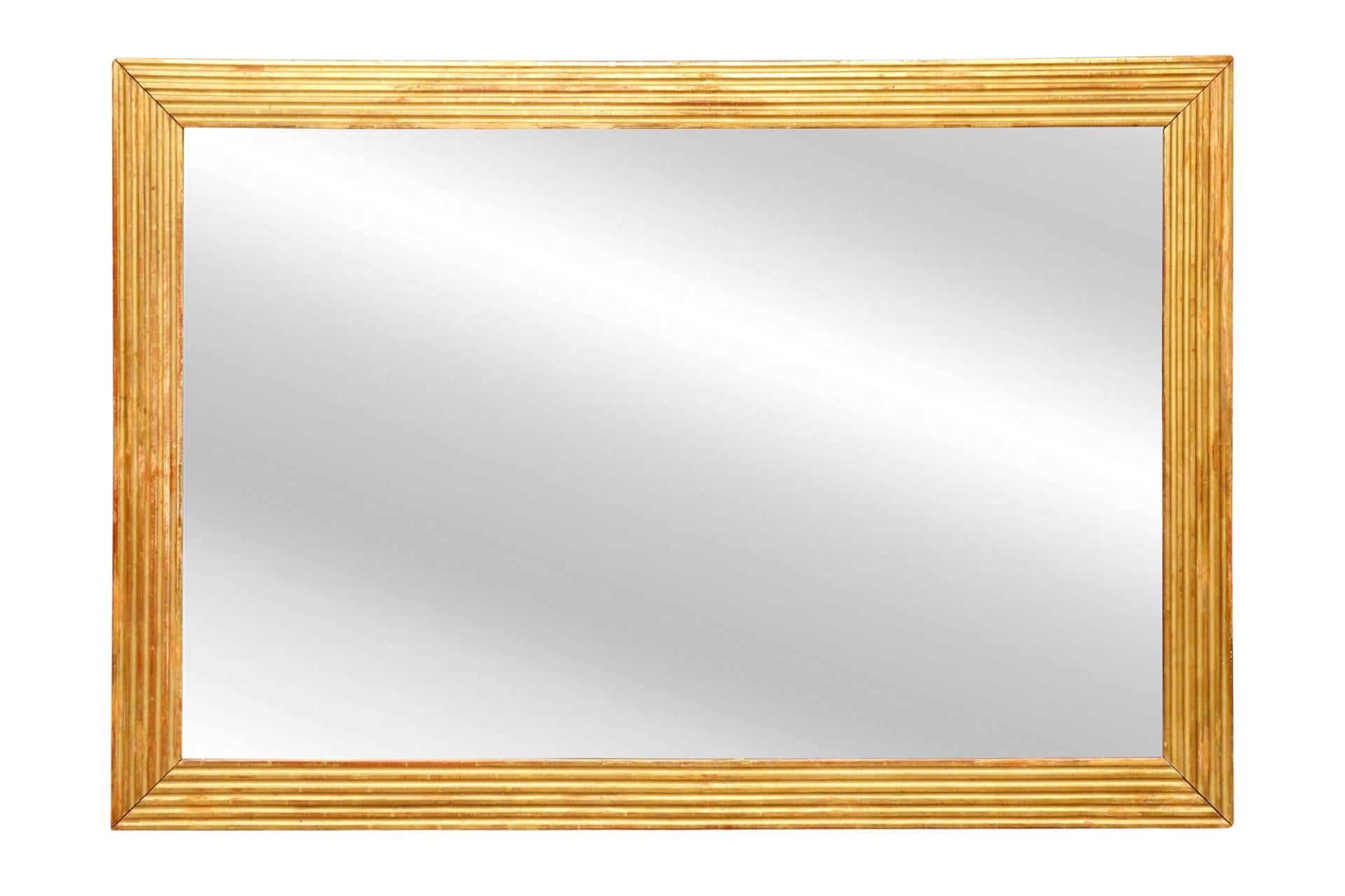 Lovely water gilt frame with mirror. Created during the French Restoration Period, 1820.