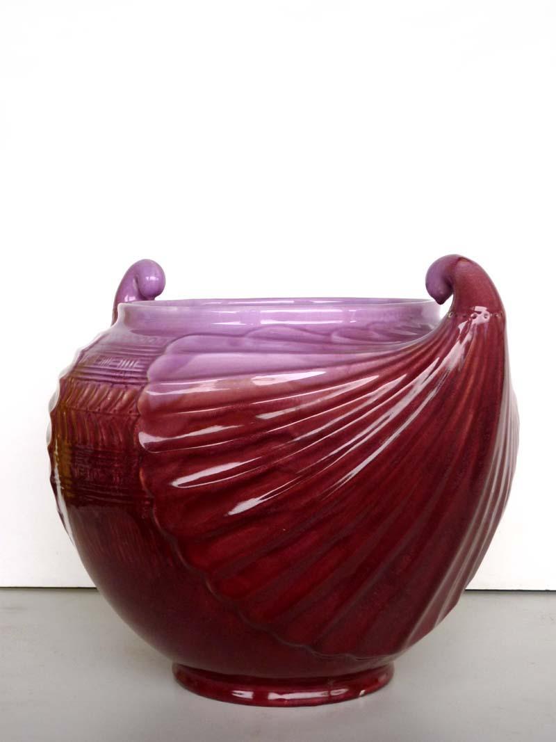Cache-pot en céramique violette
Conditions parfaites.