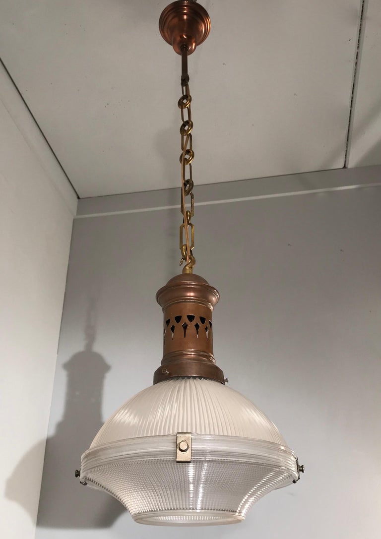 Museum quality and condition Holophane pendant.

It does not matter whether you are decorating an Art Deco, a Mid-Century Modern or a contemporary home or office, if you have the right space for it then this stunning, timeless and practical size