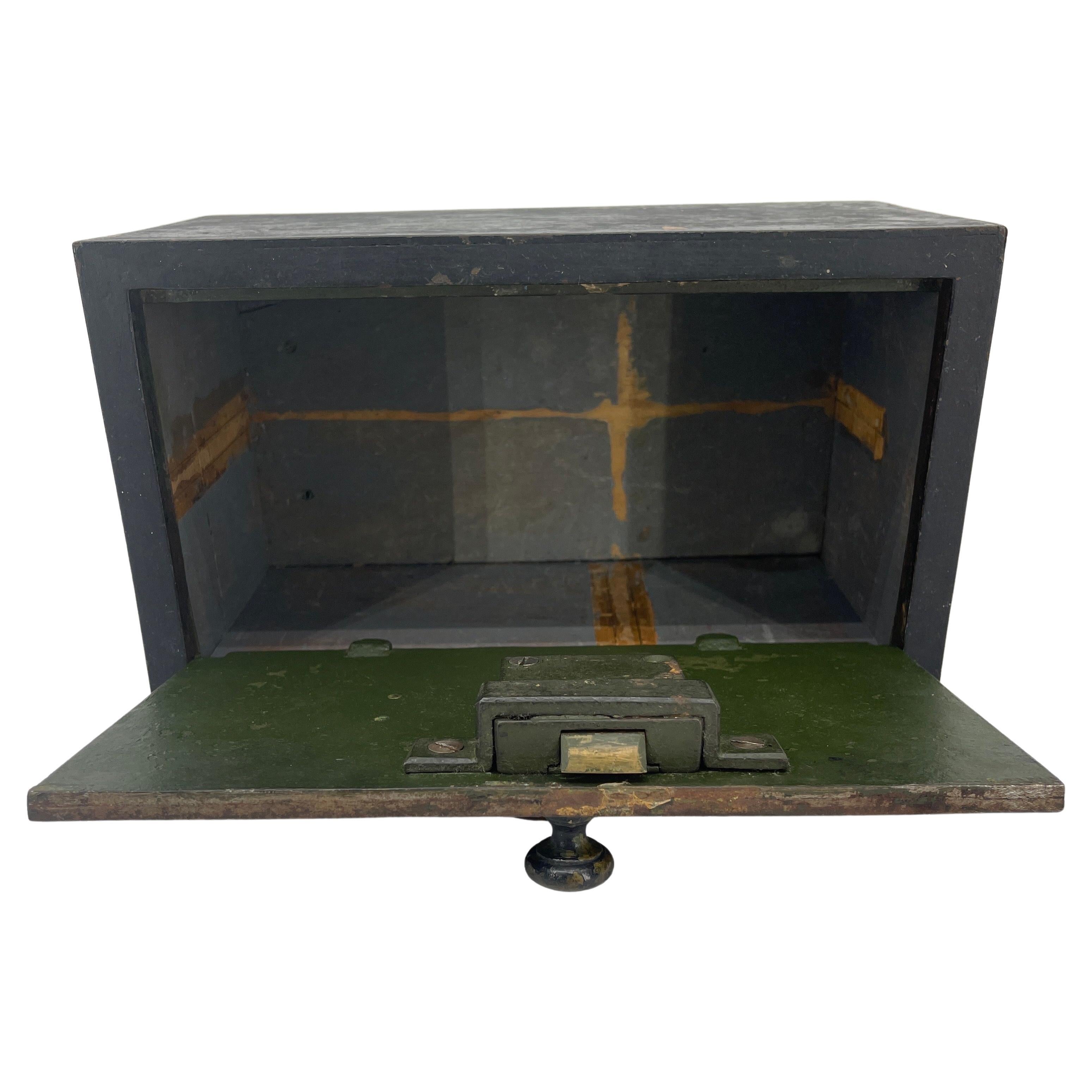 Early 1900 Hundreds lock box safe. The safe is in black painted steel with brass hardware and key.