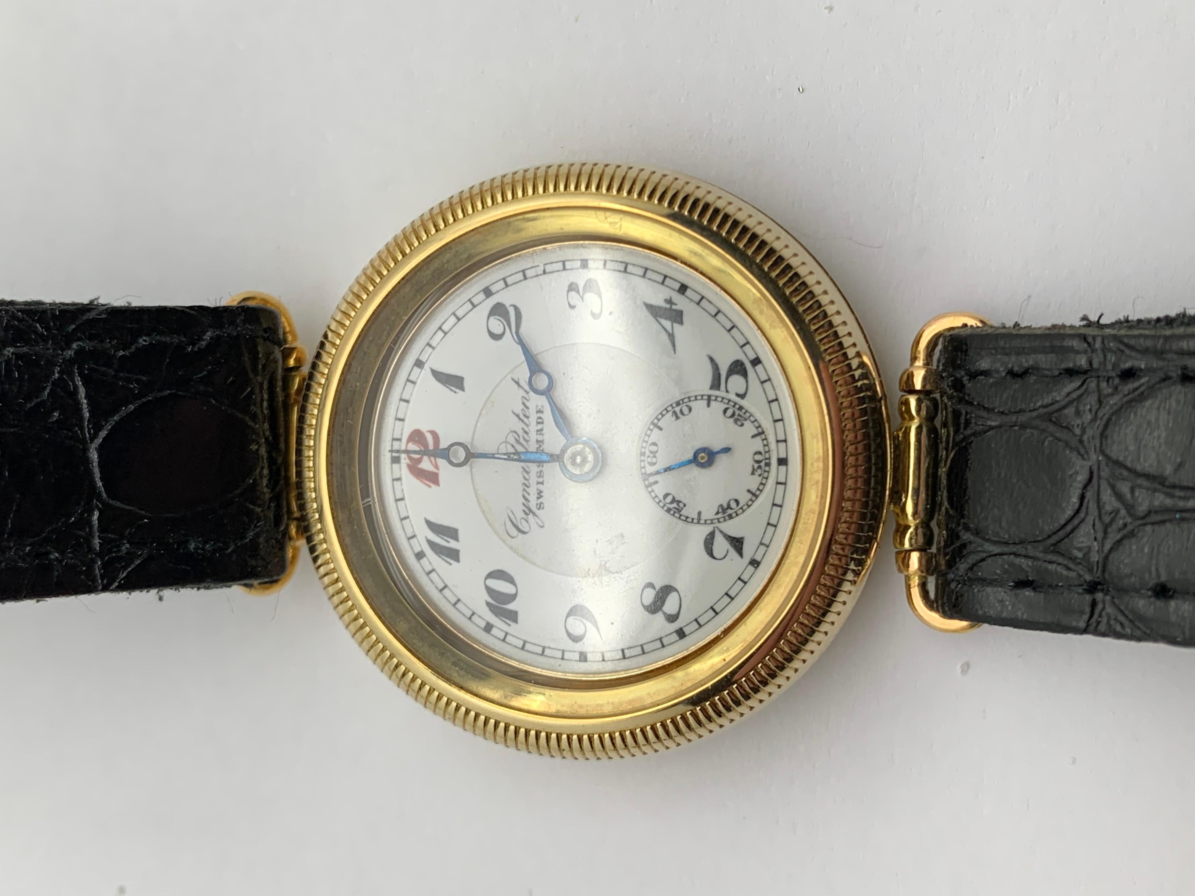 14 karat solid yellow gold Cyma “Hermetic Trench watch with Swing Lugs, that is what you are seeing. In my world of watch collecting, restoration and refinishing, the word “Rare” is often thrown out without any regard to the watch. It is often